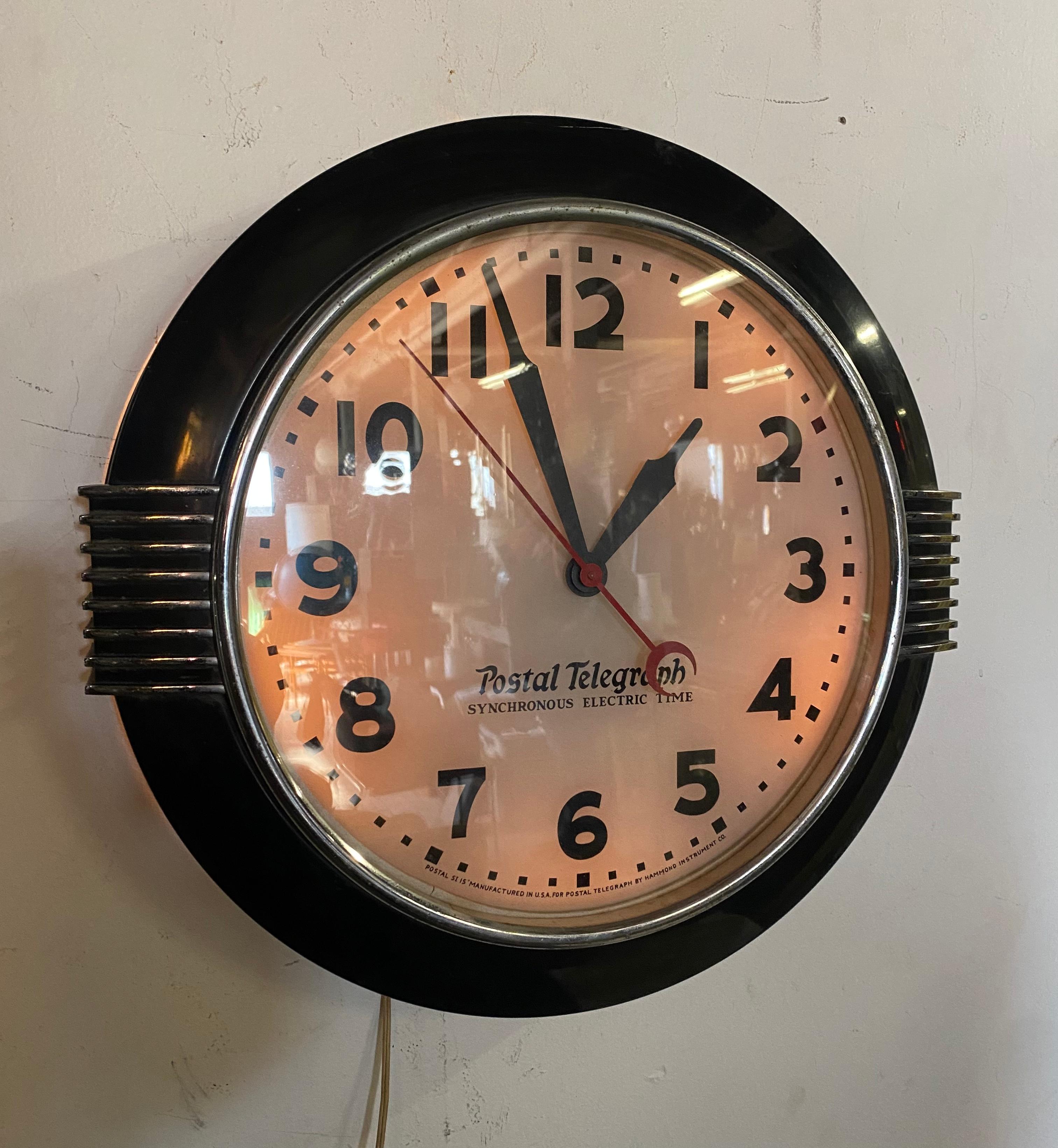 Large American Art Deco Chrome and Black Illuminated Dial Wall Clock by Hammond In Good Condition In Buffalo, NY