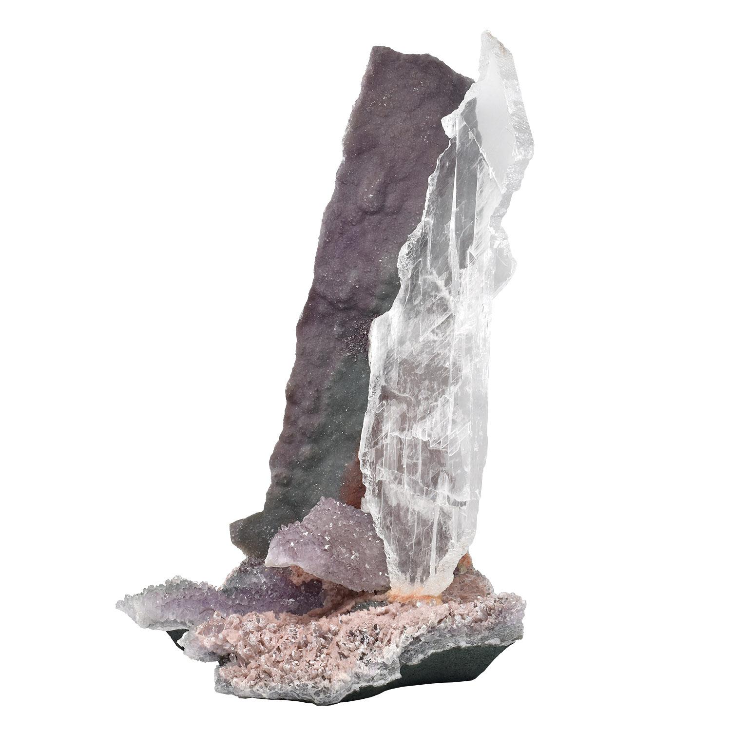 Large Amethyst and Gypsum Mineral Specimen sculpture

A transparent gypsum crystal mounted on a portion of natural matrix encrusted with small, pale, multicolored amethyst crystals. The upright panel’s crystals range from pale amethyst to green to