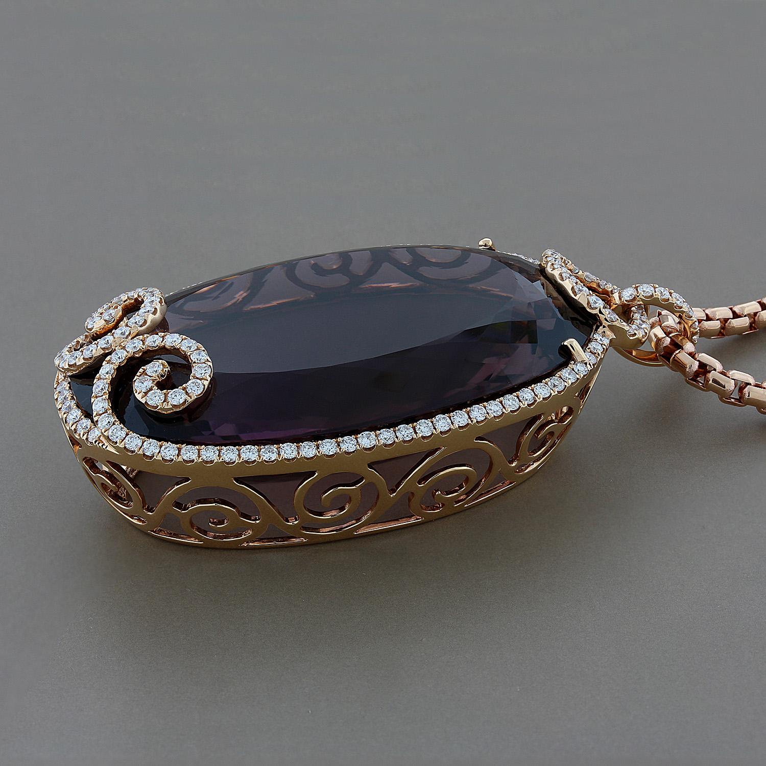 A bold pendant featuring a 187 carat oval shape amethyst gemstone adorned by 2.76 carats of round cut diamonds. The massive amethyst is secured in a 18K rose gold basket setting, and comes with an 18 inch rose gold chain necklace. 

Dimensions: 2.25
