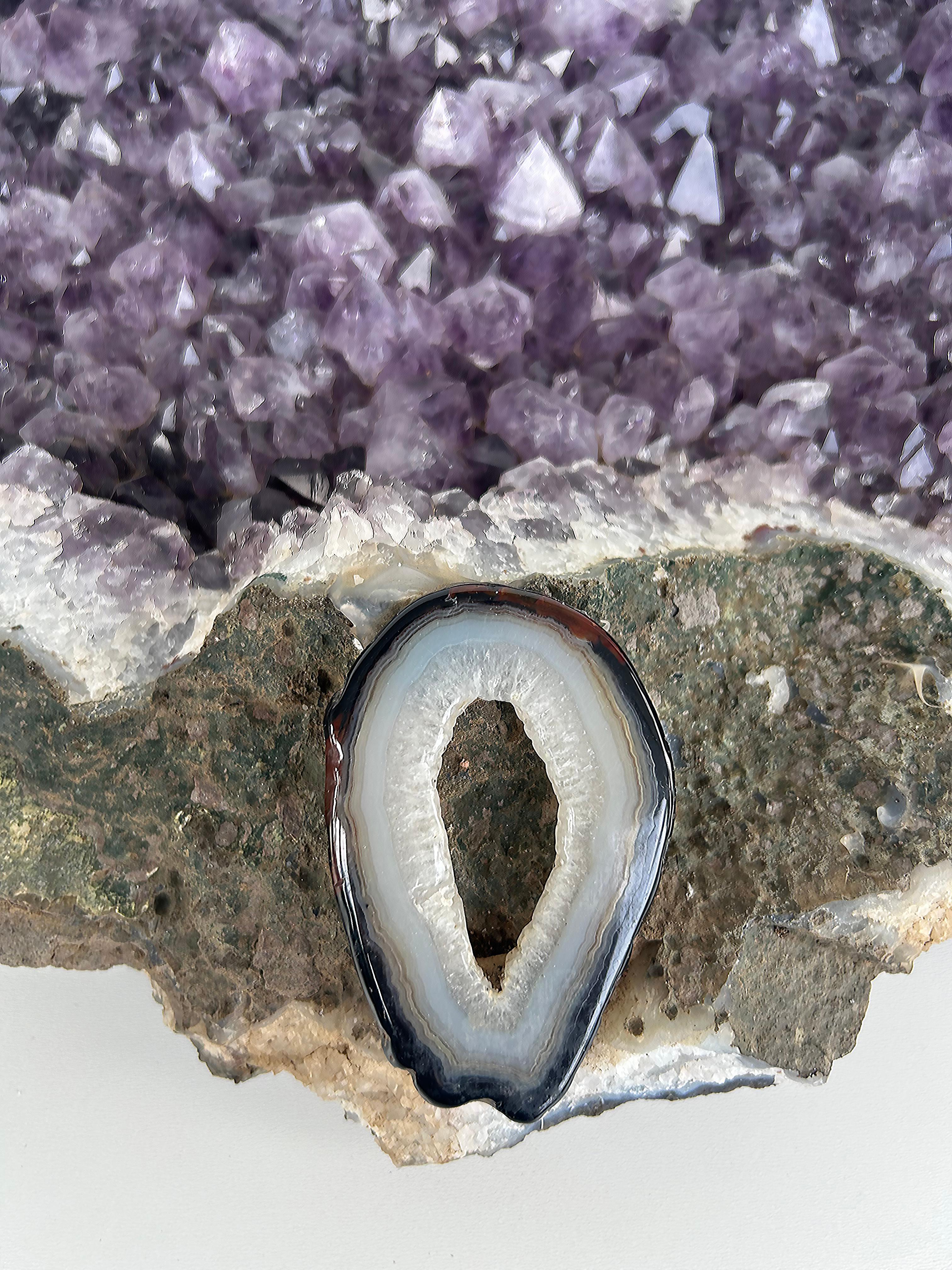 Large Amethyst Quartz Crystal Natural Specimen Geode, 26 pounds 

Offered for sale is an Amethyst cluster crystal geode. The piece is a deep purple crystal within an open end of amethyst with quartz surrounding the edges. The back is uncut and raw.