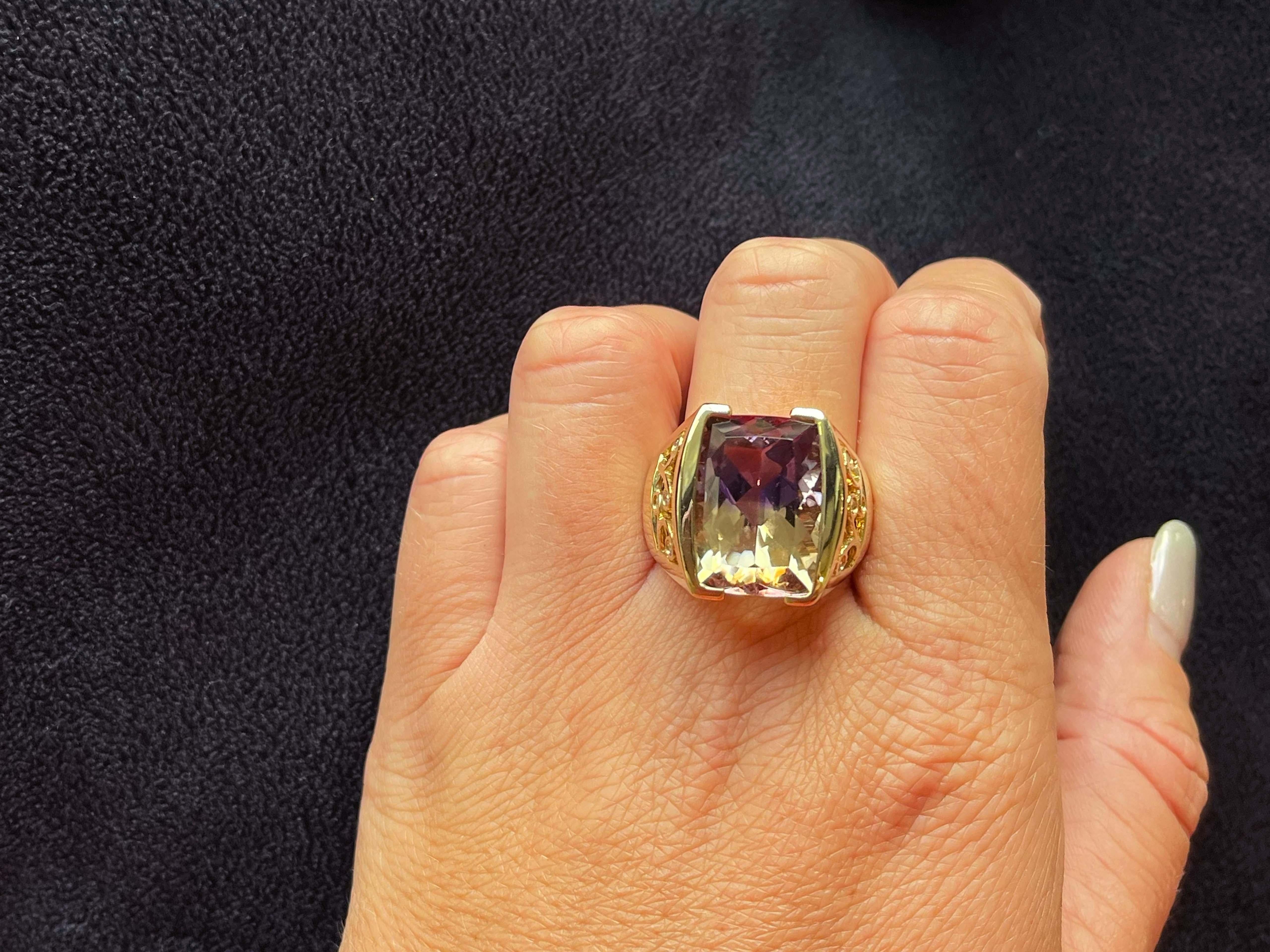 Item Specifications:

Metal: 14k Yellow Gold

Ring Weight: 14.9 grams

Ring Size: 9

Gemstone Specifications:

Gemstone: Ametrine

Ametrine Measurements: 18.03 mm x 13.6 mm x 8.61

Ametrine Carat Weight: ~19.38 Carats

Color: Purple and