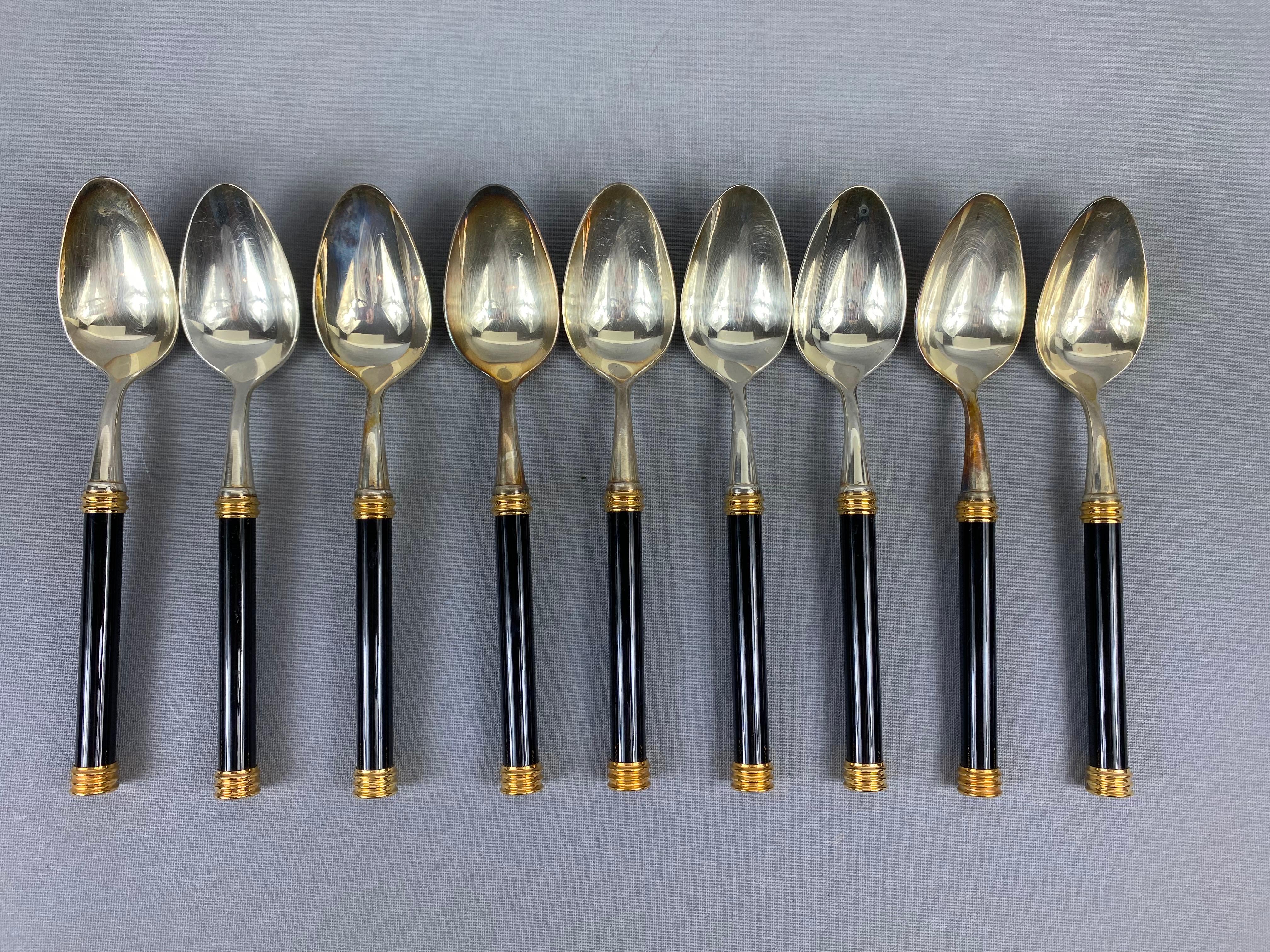 Large Vuillermet France cutlery set in black gold with knife rests

Beautiful rare large 45-piece silver cutlery set from Vuillermet, France, circa 1950s-1960s. The handle is probably framed in bakelite and beautifully gilded. The set consists of
