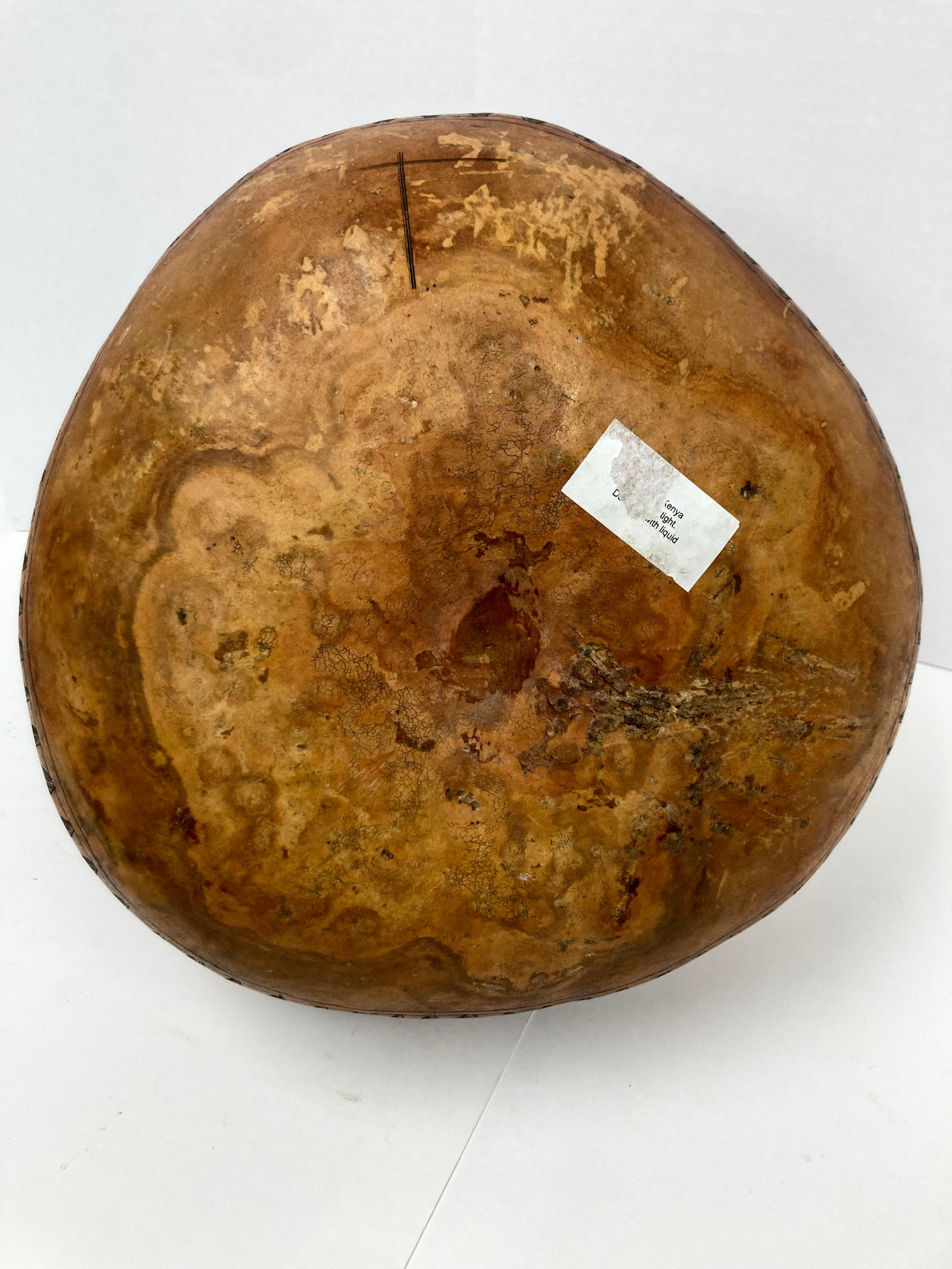 Organic Material Large and Decorative African Gourd with Elephant Herd Design For Sale