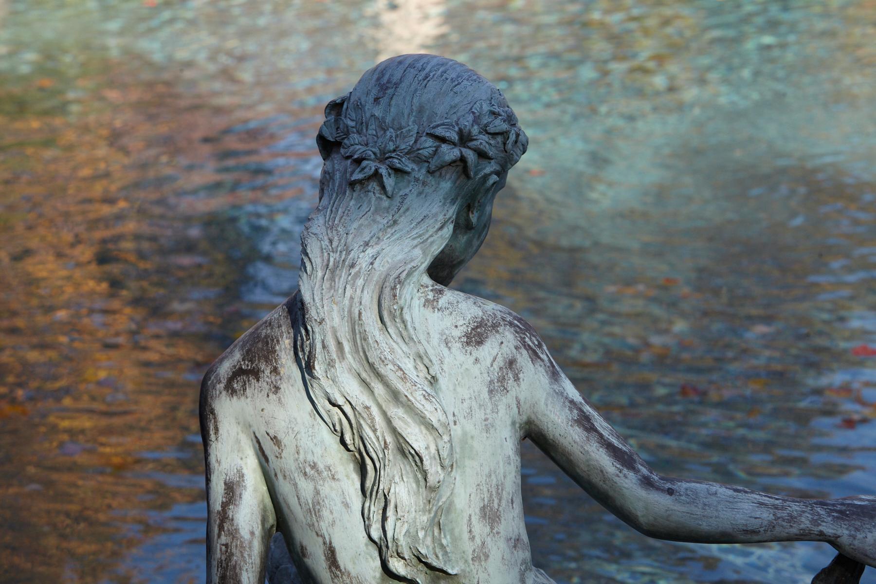 bronze mermaid statue