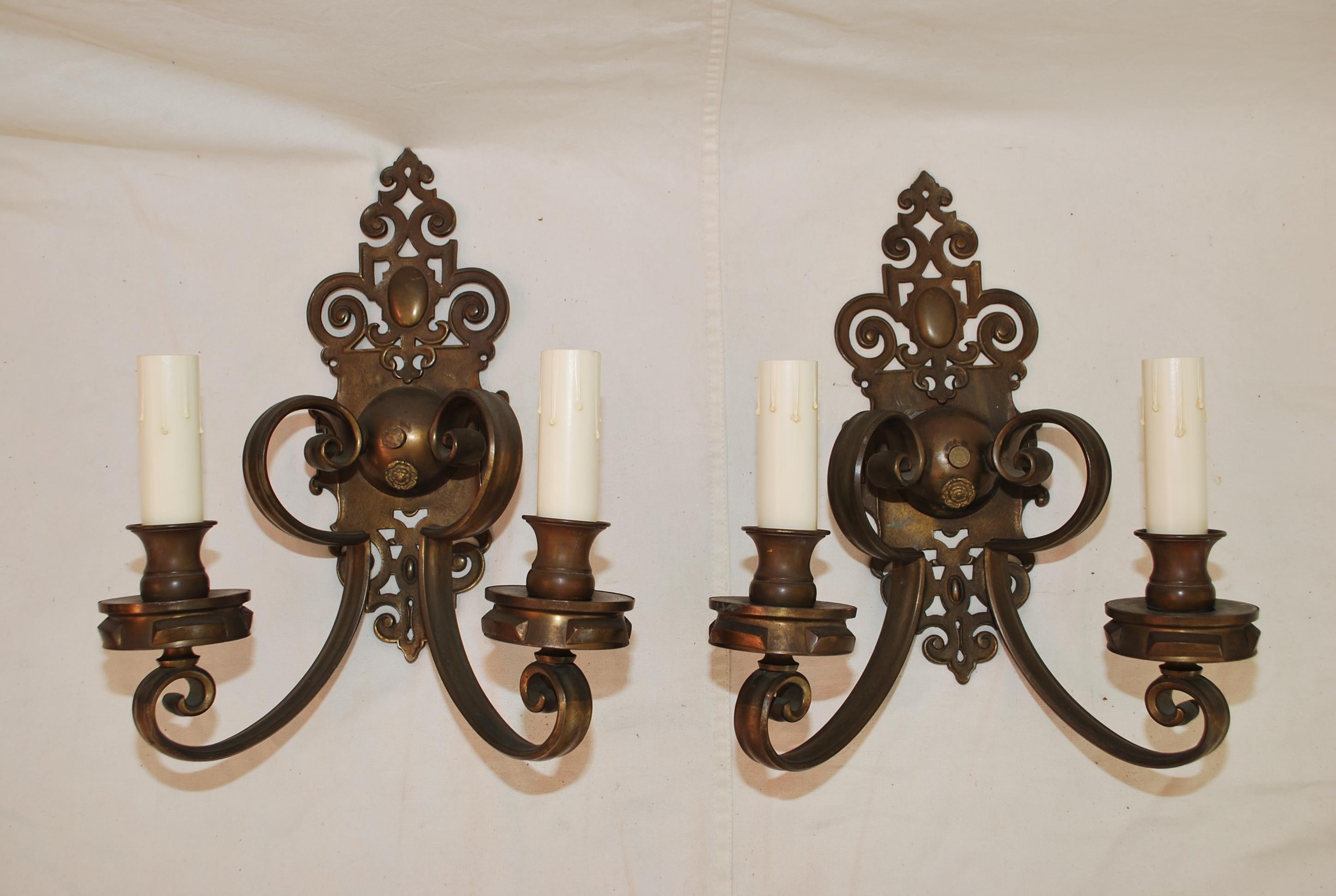 American Large and elegant pair of 1920's brass sconces For Sale