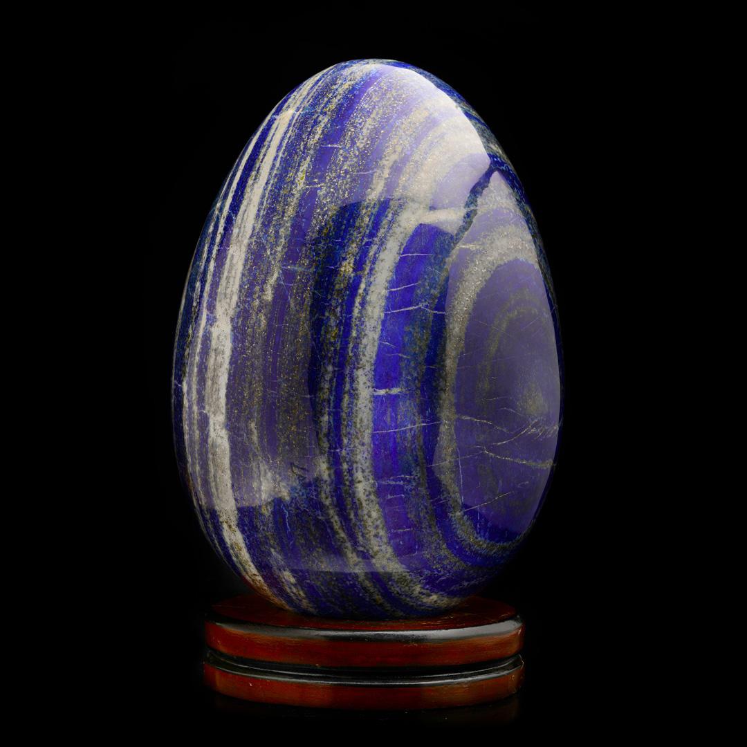 Polished large and Exceptional Lapis Lazuli Egg on Wooden Base For Sale