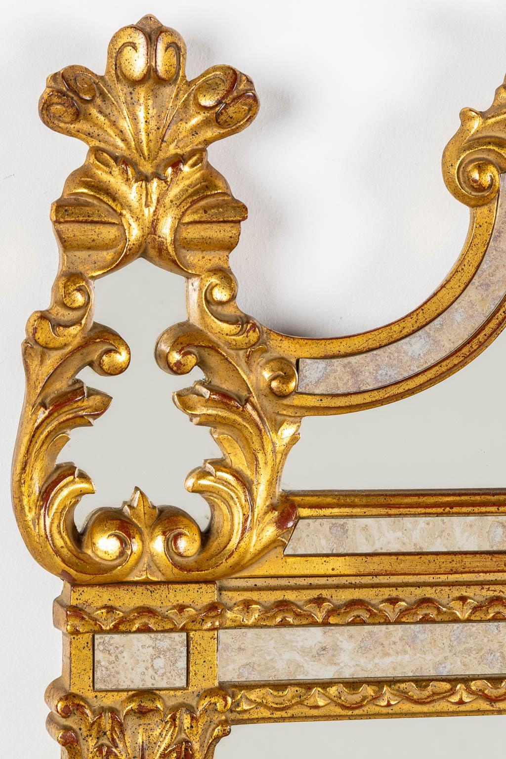 Hand-Crafted Large and exquisite Louis XVI style gilt framed mirror by Deknudt For Sale