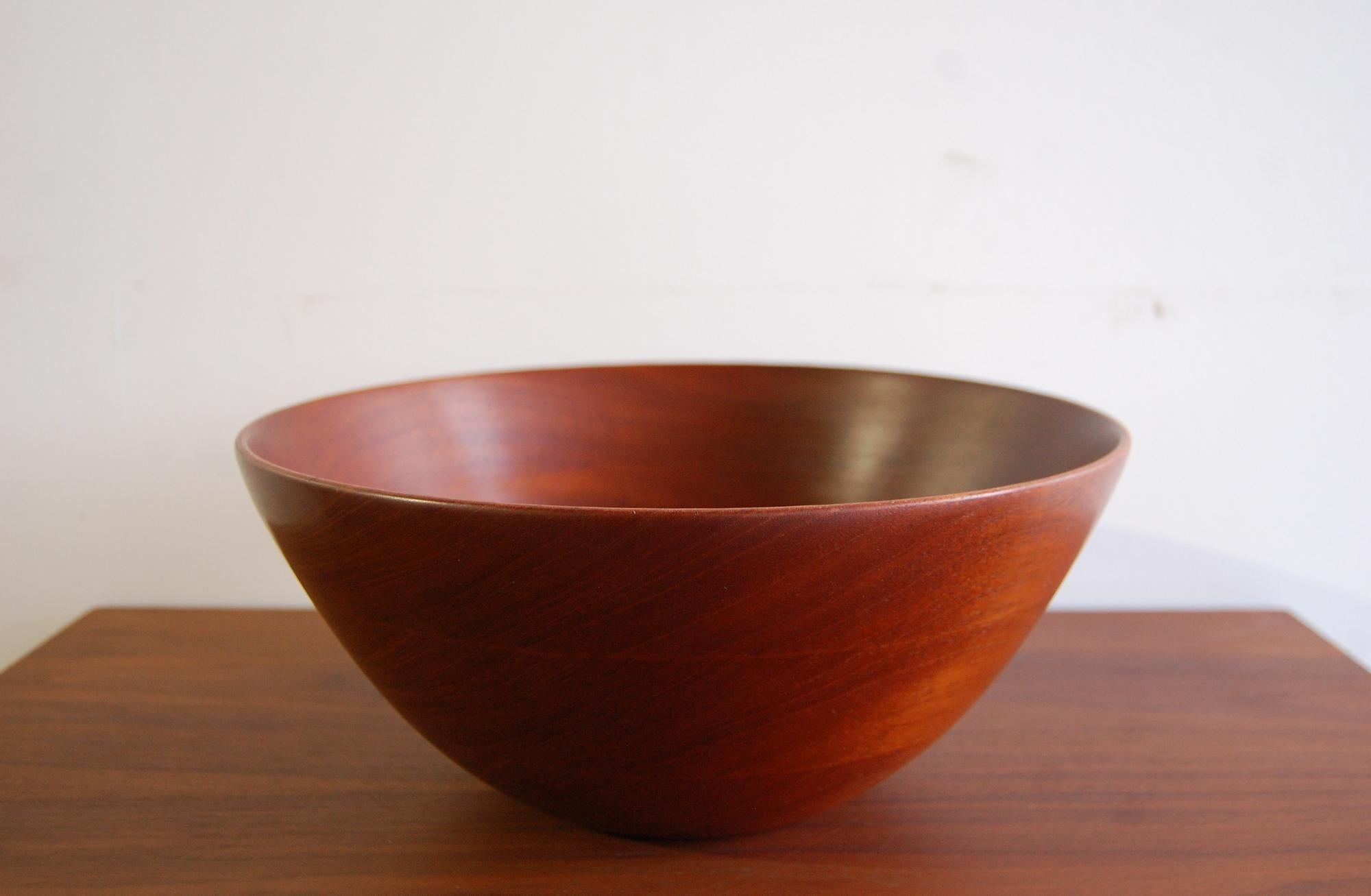 Large, and exquisitely turned Teak bowl by Frederik Lunning. Bowl measures 11 3/4