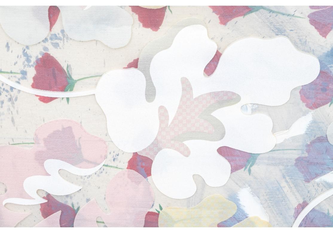 A very large and incredibly decorative Abstract Floral painting which utilizes a a fabric on fabric technique. The underlying fabric is screen printed with colorful red blossoms with green stems and is overlaid with a see through fabric printed with