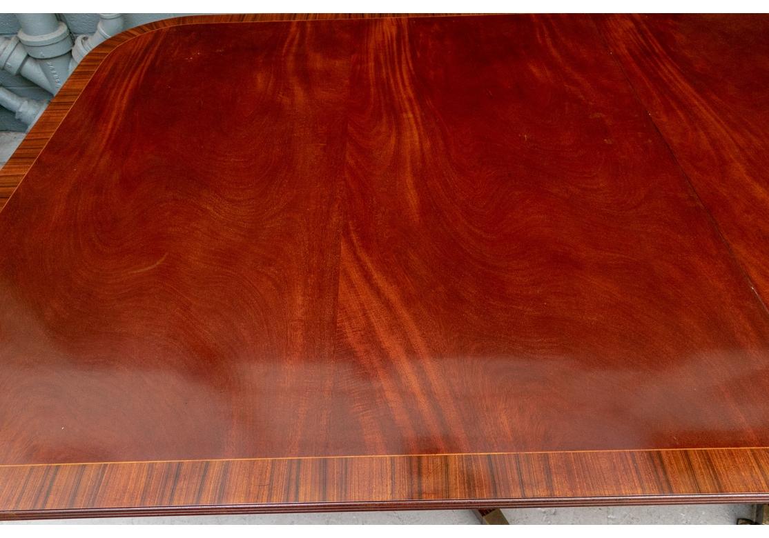 20th Century Large And Fine Double Pedestal Banded Mahogany Dining Table For Sale