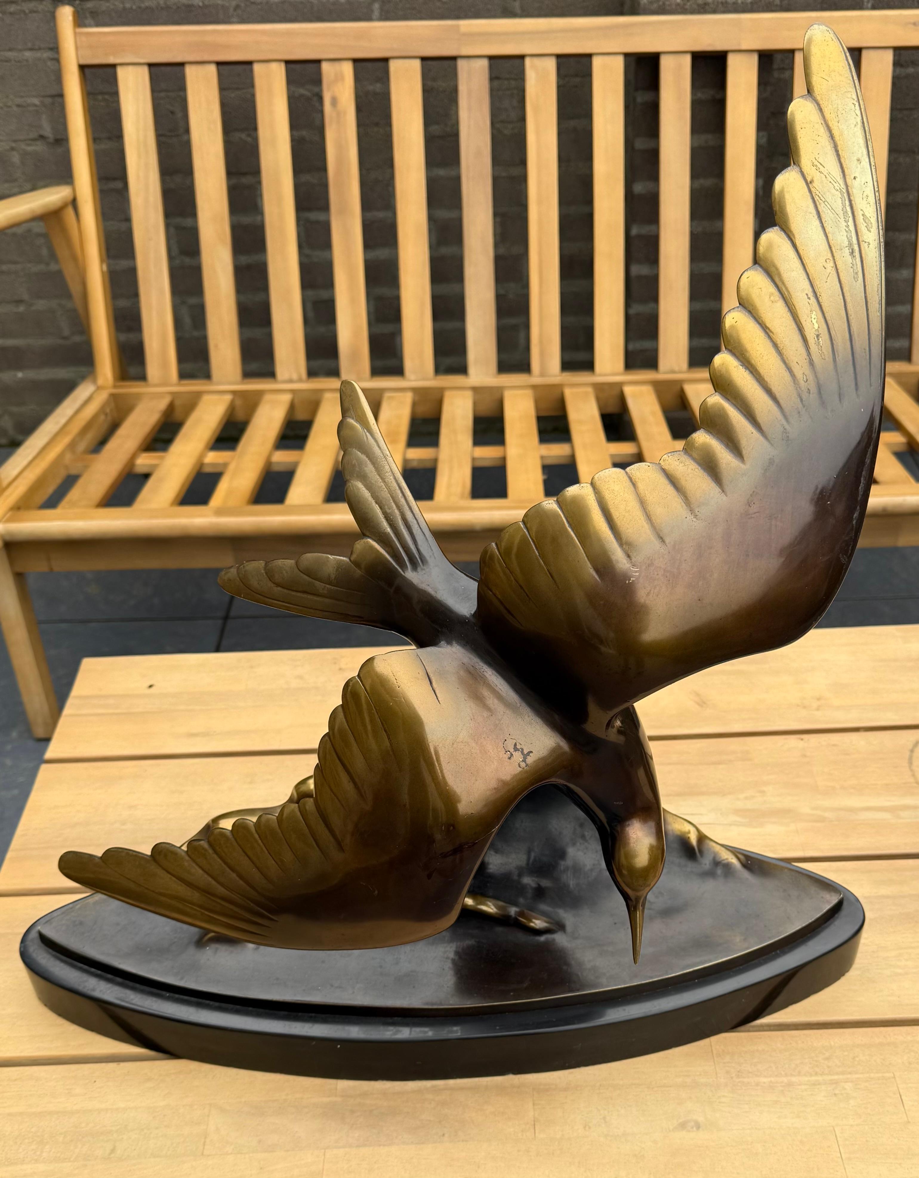 This bronze seagull and black marble base is one of our favourite purchases so far this year.

To us, this Art Deco era sculpture epitomizes everything the Art Deco period stood for. Firstly, it ofcourse is no coincidence that the artist chose a