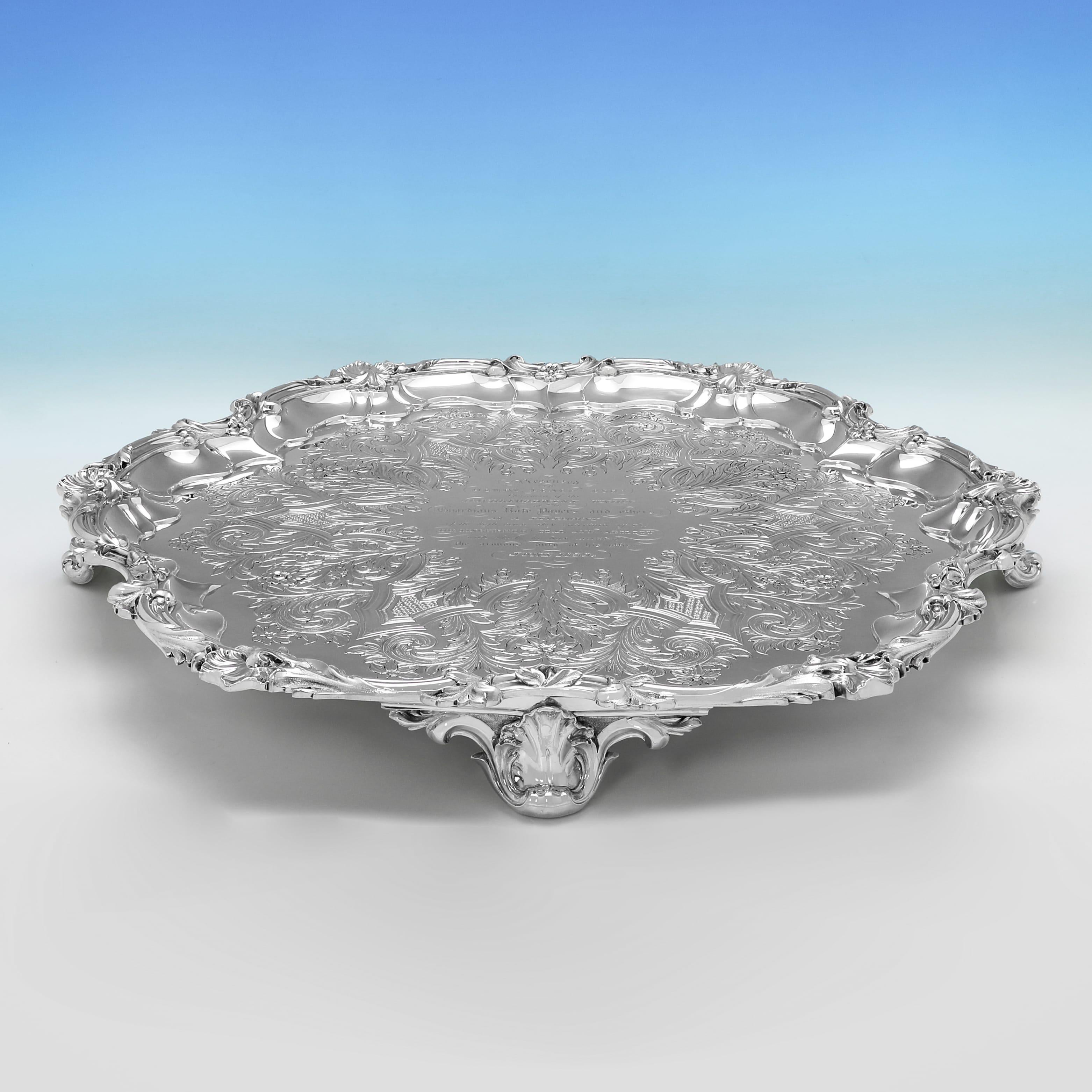 Hallmarked in London in 1837 by Edward, Edward Junior, John & William Barnard, this exceptional sterling silver salver is generously proportioned and finely worked. It measures 26 inches (66 cm) in diameter, stands 3 inches (7.5 cm) tall, and weighs