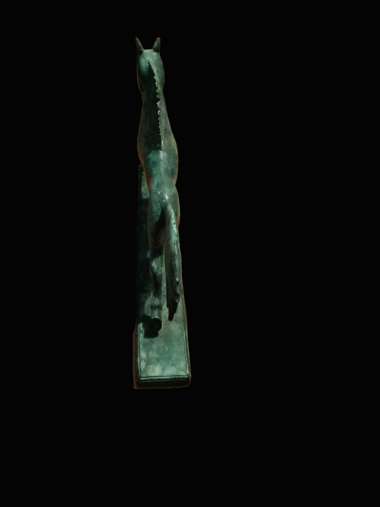 Large and Heavy Patinated Metal Sculpture of Galloping Horse For Sale