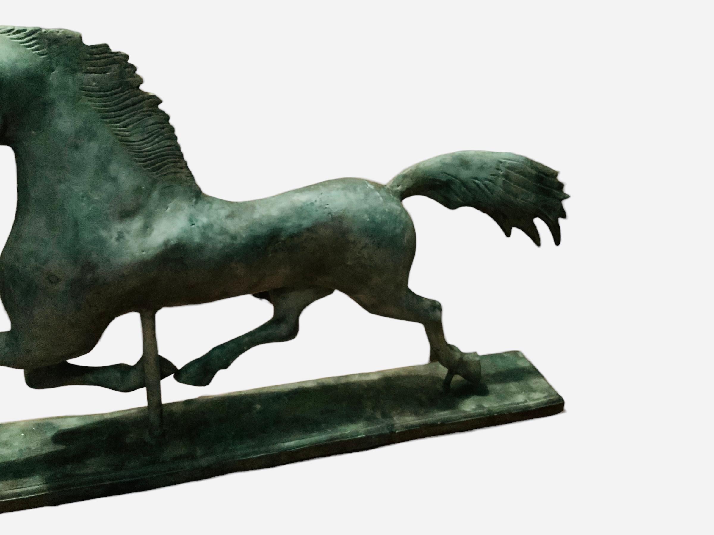 20th Century Large and Heavy Patinated Metal Sculpture of Galloping Horse For Sale
