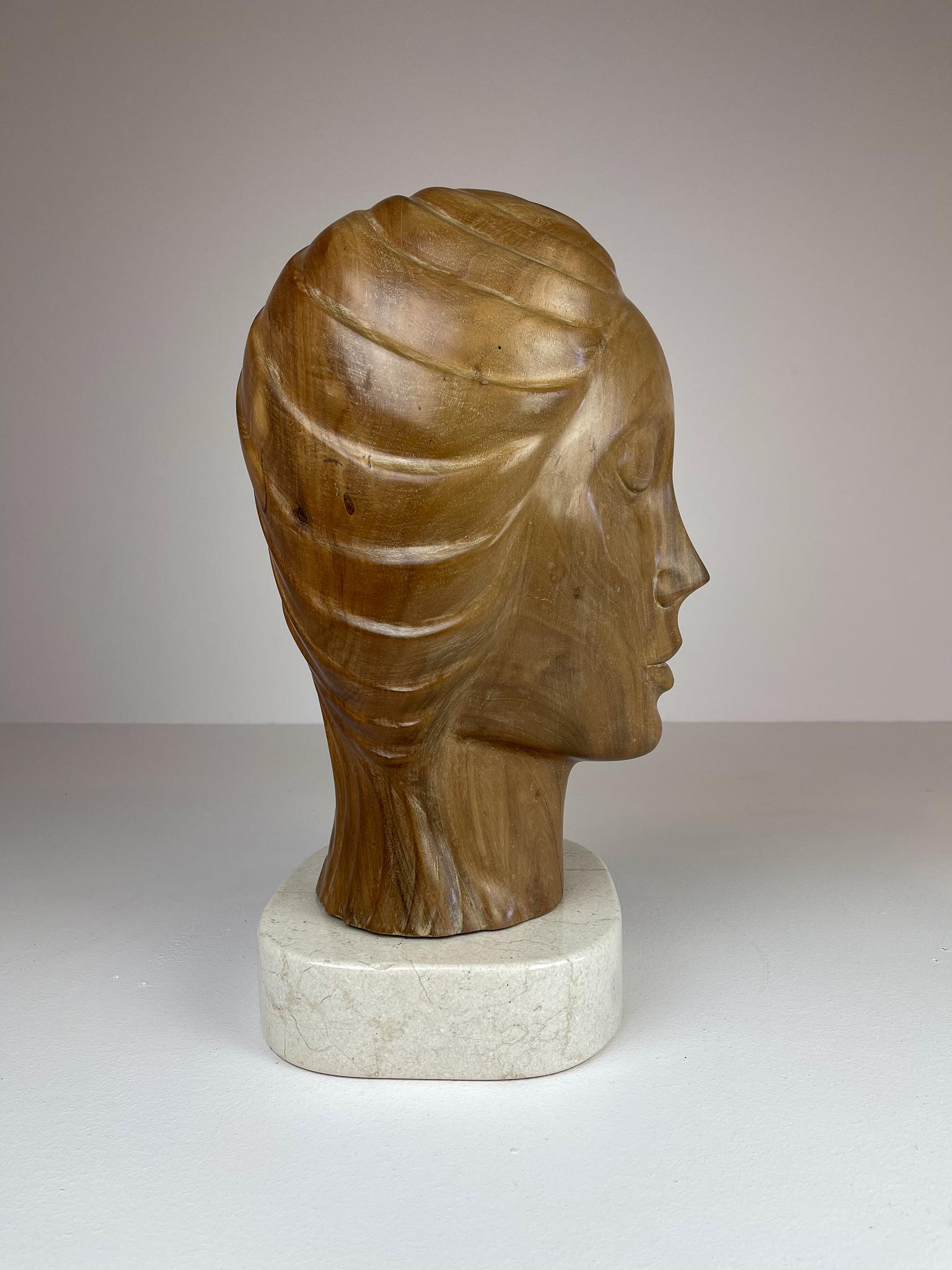 Large and Heavy Sculpture of a Female Face in Mahogany 5