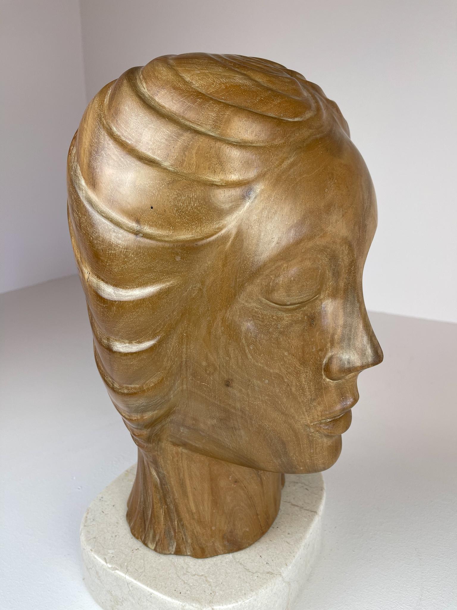 Large and Heavy Sculpture of a Female Face in Mahogany 6