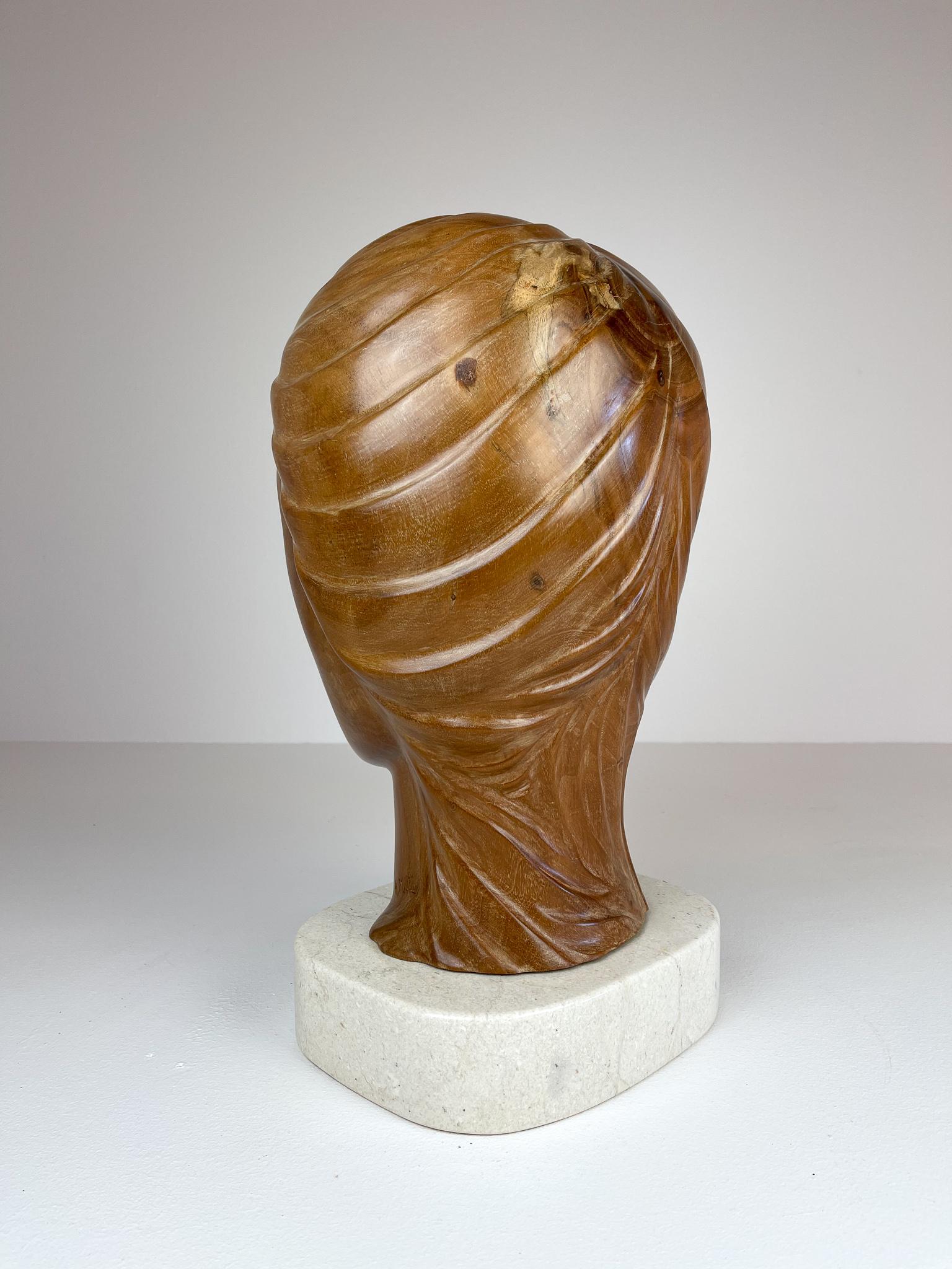 Large and Heavy Sculpture of a Female Face in Mahogany 1