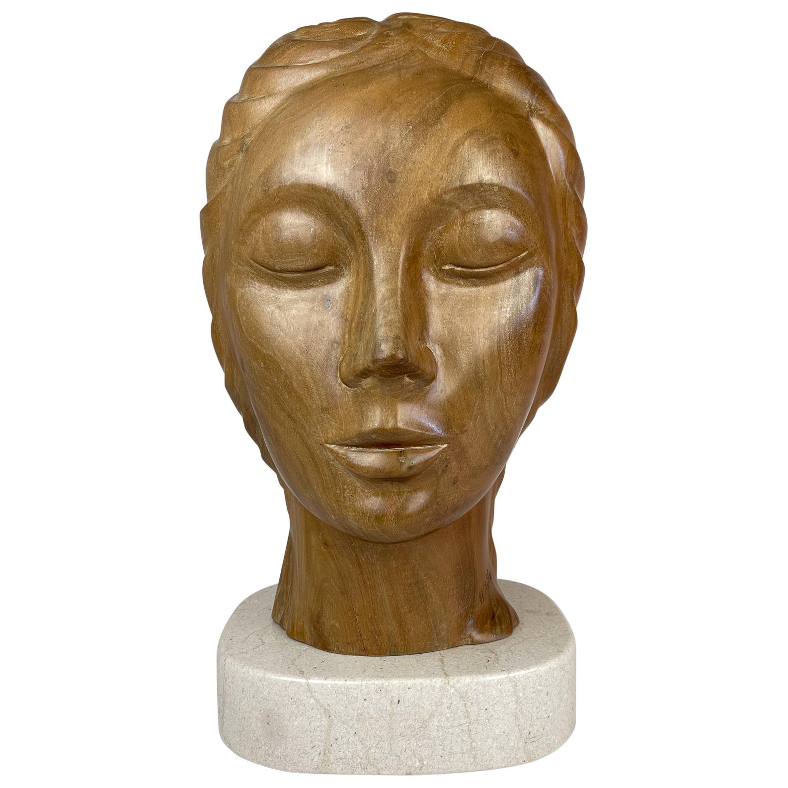 Large and Heavy Sculpture of a Female Face in Mahogany