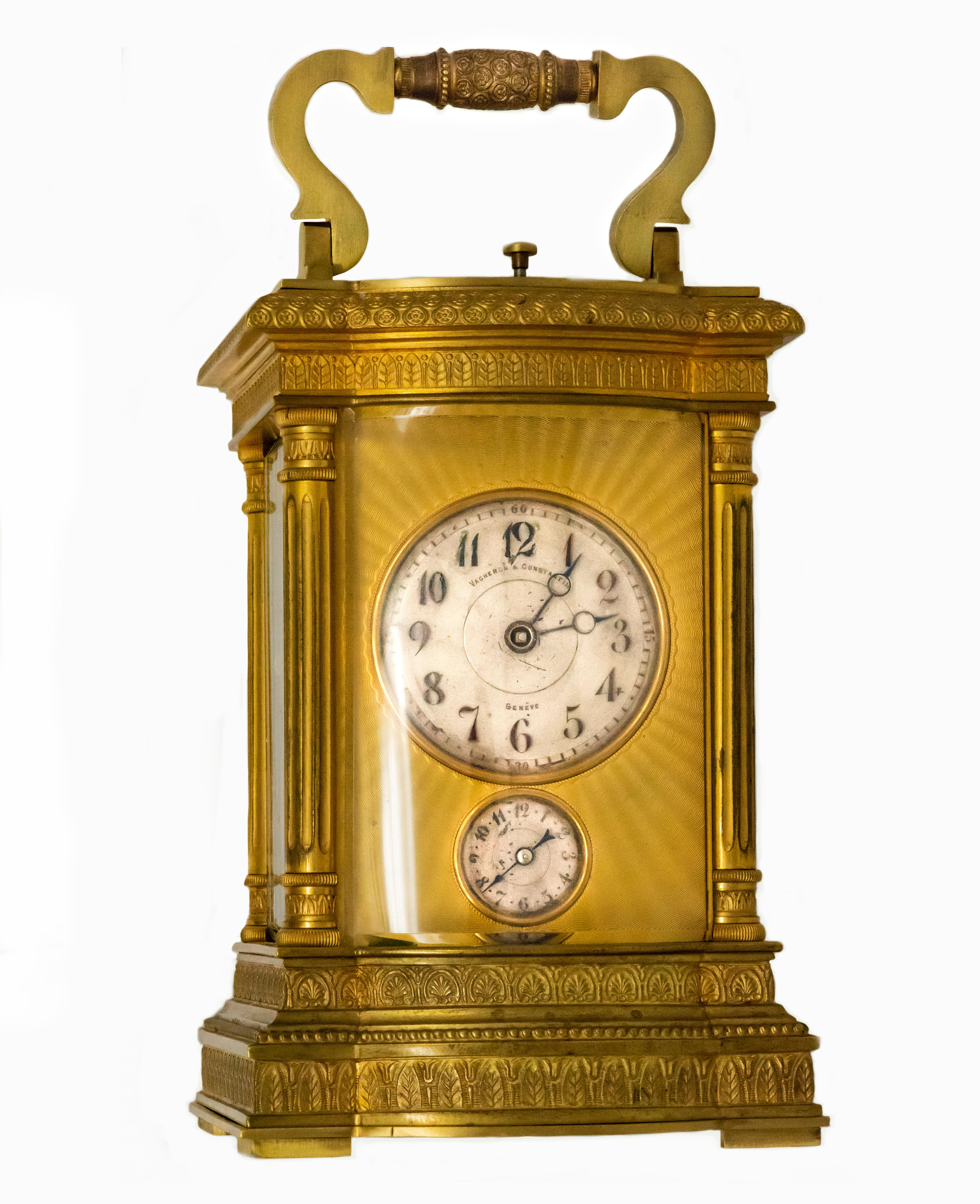 The present clock is a very rare and large, exceptional museum quality quarter hour repeating Vacheron & Constantin carriage Clock with classical greco-roman neoclassical styling demonstrated by the columns located along the sides of the dial and