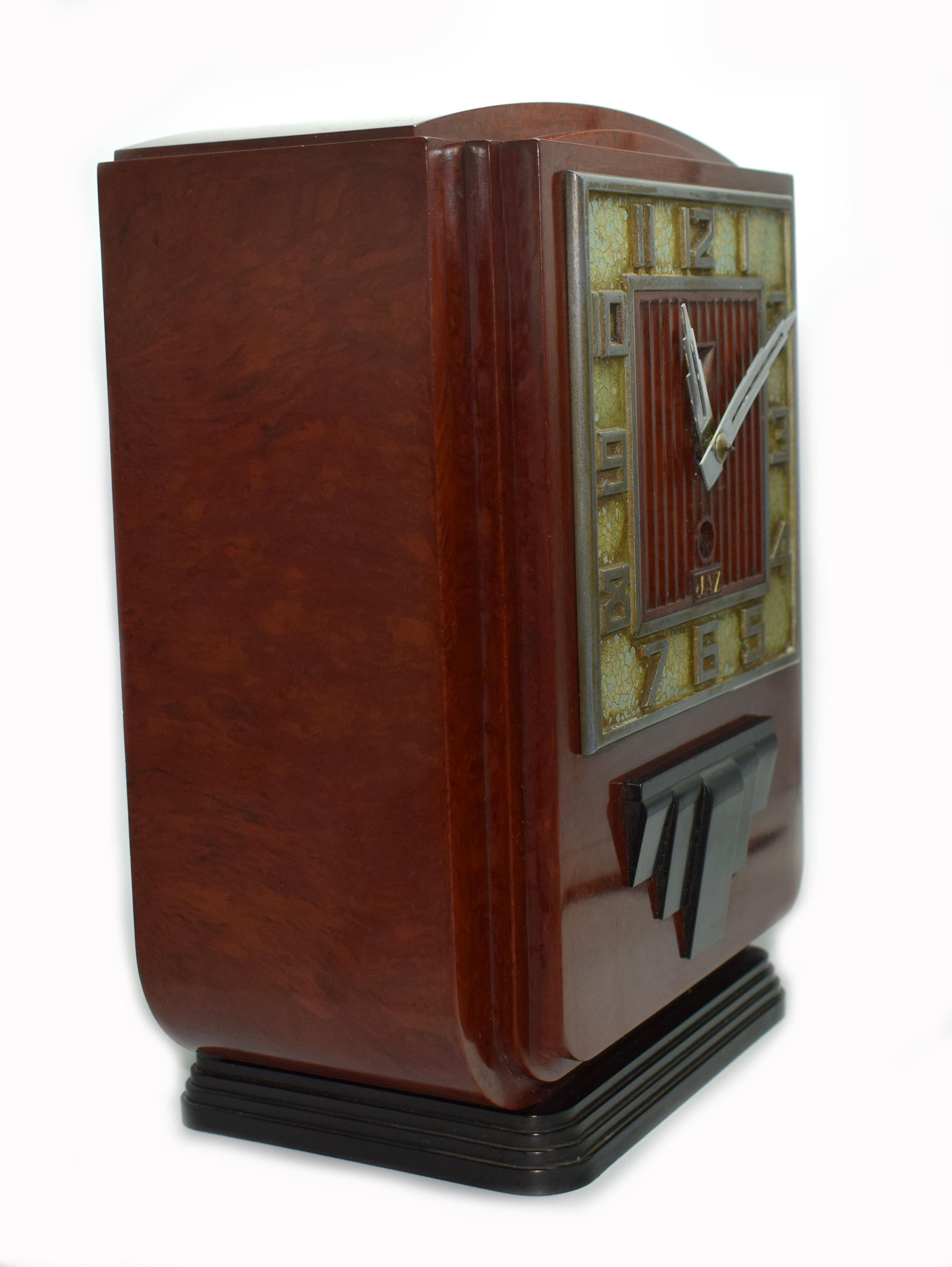This is the daddy of true 1930s Art Deco clocks. Made in France by the very collectable JAZ company, this clock screams everything about the Deco era we all love and admire, streamline, Industrial and modernist. The casing is a red mottled color,