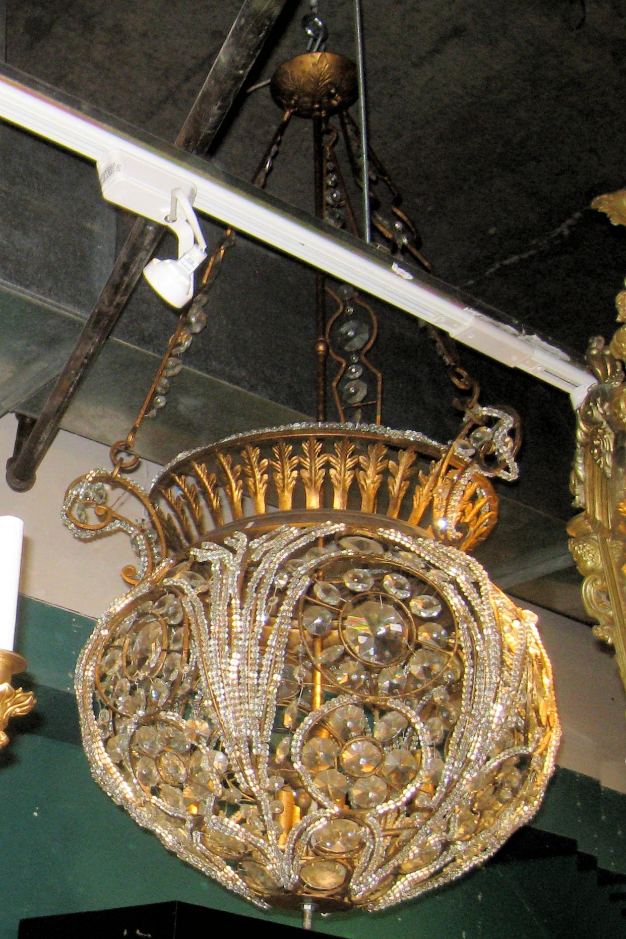 Large and unusual Baguès style domed shape beaded chandelier.
Stock Number: L327