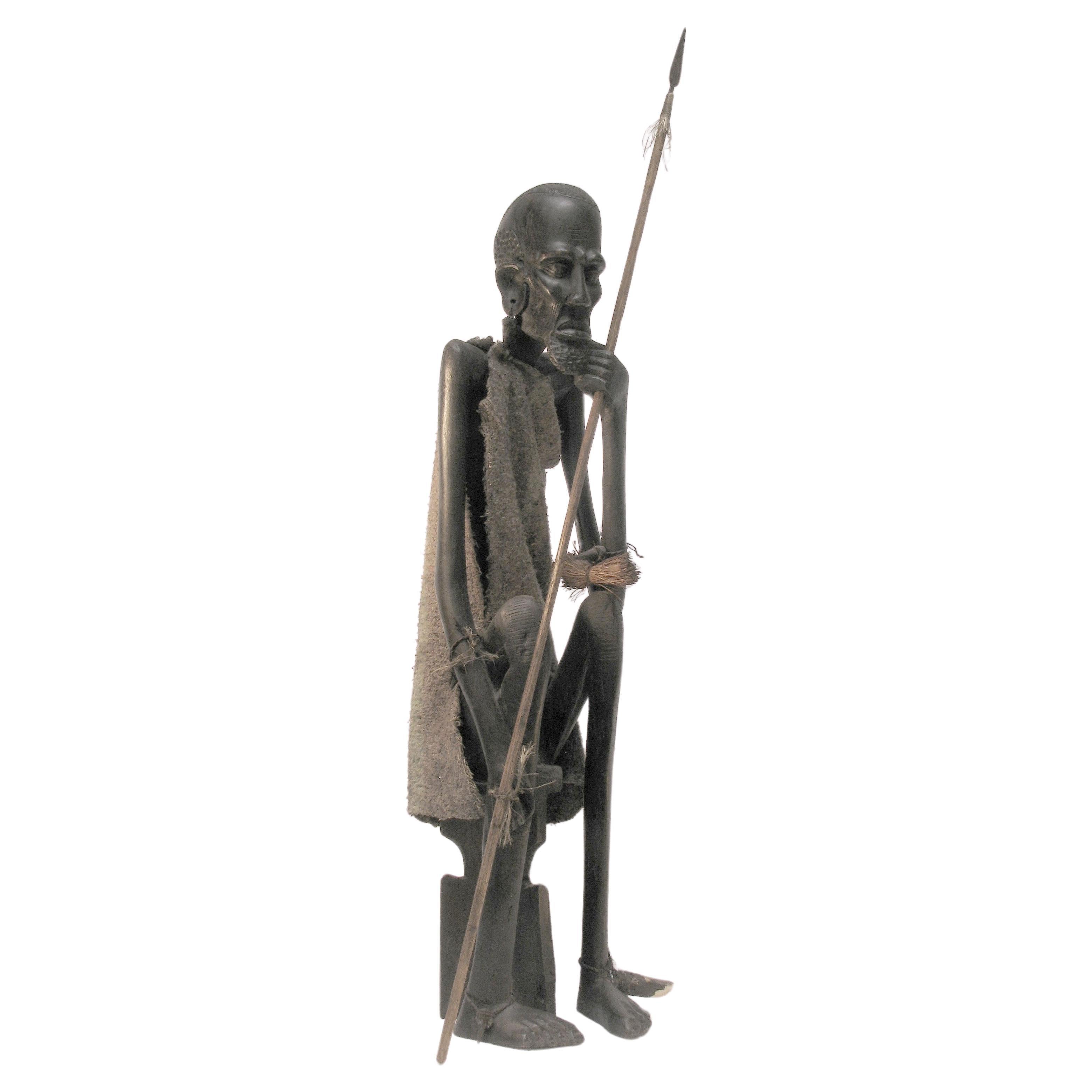 Grandes y  Impresionante estatua tallada de un cazador masai  Circa 1950 Kenia. en venta