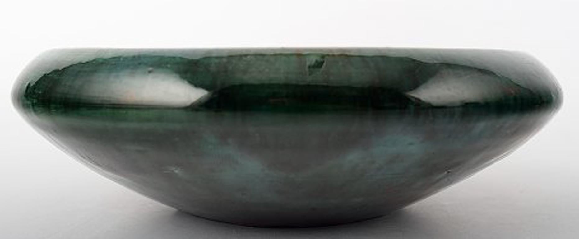 Large and impressive Danish private collection (Total of 42 vases, bowls, figurines, etc.) 
Soren Kongstrand 1872-1951) and 
Jens Petersen (1890-1956) 
Dish, Soren Kongstrand, unsigned. 
Measuring 17 x 5 cm. 
In perfect condition. 
The