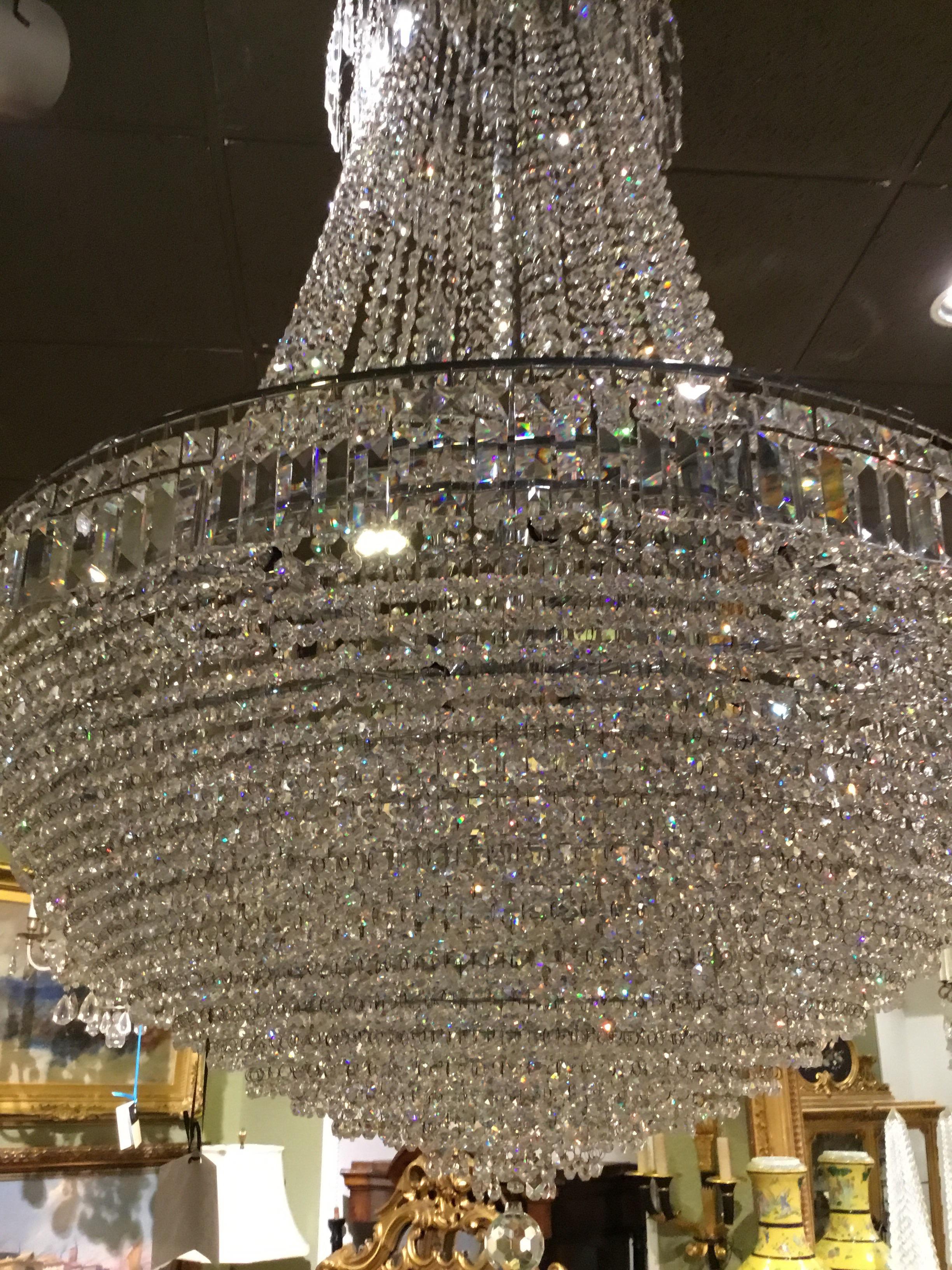 Straus crystal chandelier with very large spray of lights
which reflects great color. Multiple layers of lights in several
Directions that make this piece really sparkle 