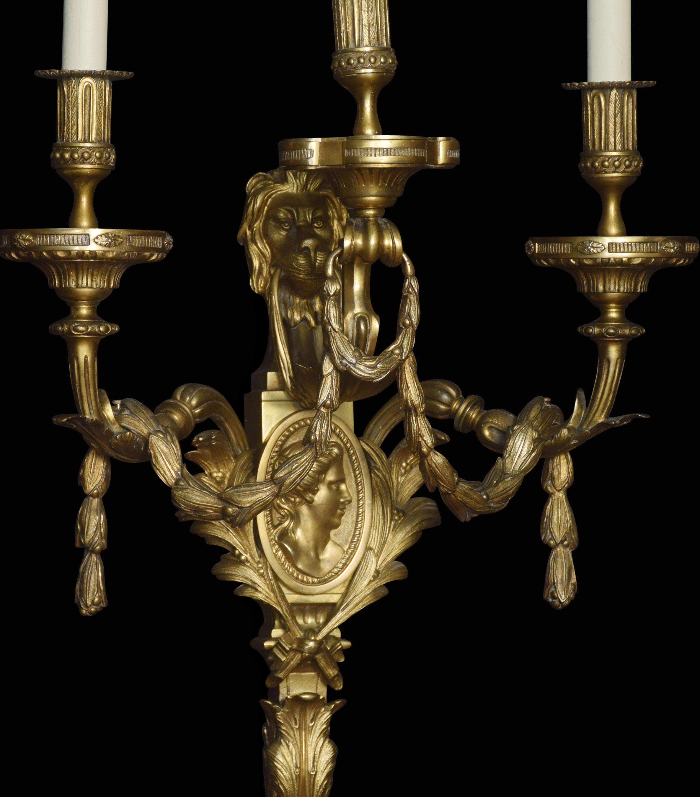 Bronze Large and Impressive Pair of Louis XVI Style Three-Branch Wall Lights For Sale