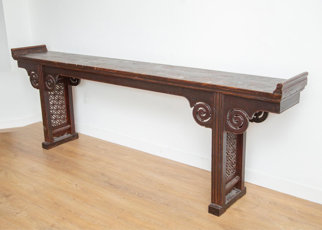 Large and narrow Chinese altar console, 20th century
Scrolling and geometrical motifs
Nicely distressed patina, with dark red/burgundy hue
We love the proportions, perfect for an entrance, foyer
Available to view in situ in our Miami showroom.
