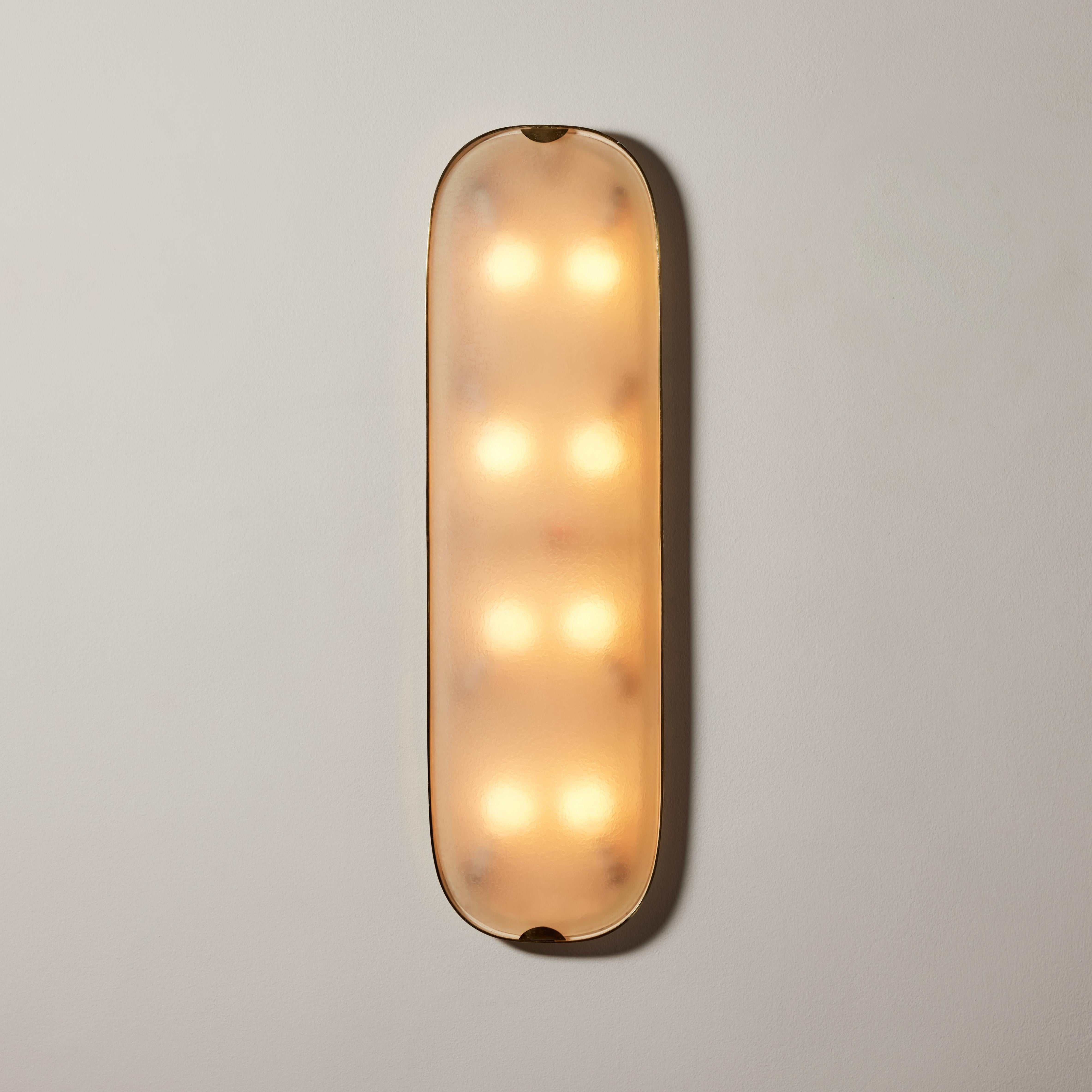 Large and rare flush mount wall/ceiling light by Fontana Arte. Designed and manufactured in Italy, circa 1950's. Glass, brass. Wired for U.S. standards. We recommend eight E14 candelabra 25w maximum bulbs. Bulbs not included.