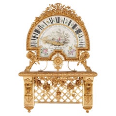 Grande et rare horloge à support de style Louis XVI en bronze doré et porcelaine par Planchon
