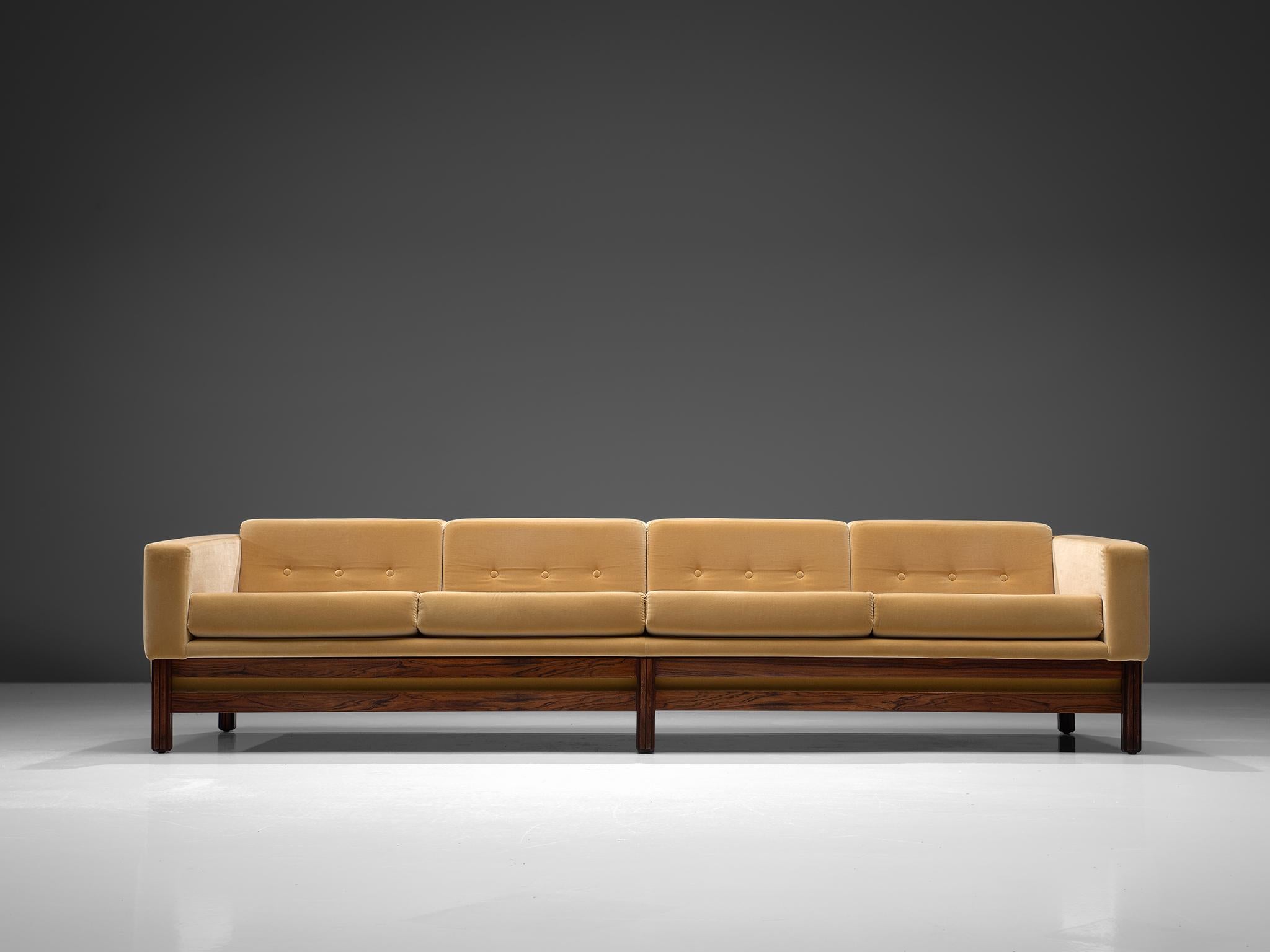 Sofa, in rosewood and fabric by Saporiti, Italy, 1960s.

This sofa, equipped with a solid rosewood frame is reupholstered in high quality yellow velours like fabric. Done by our own team of specialists of the in-house atelier. The sofa is designed