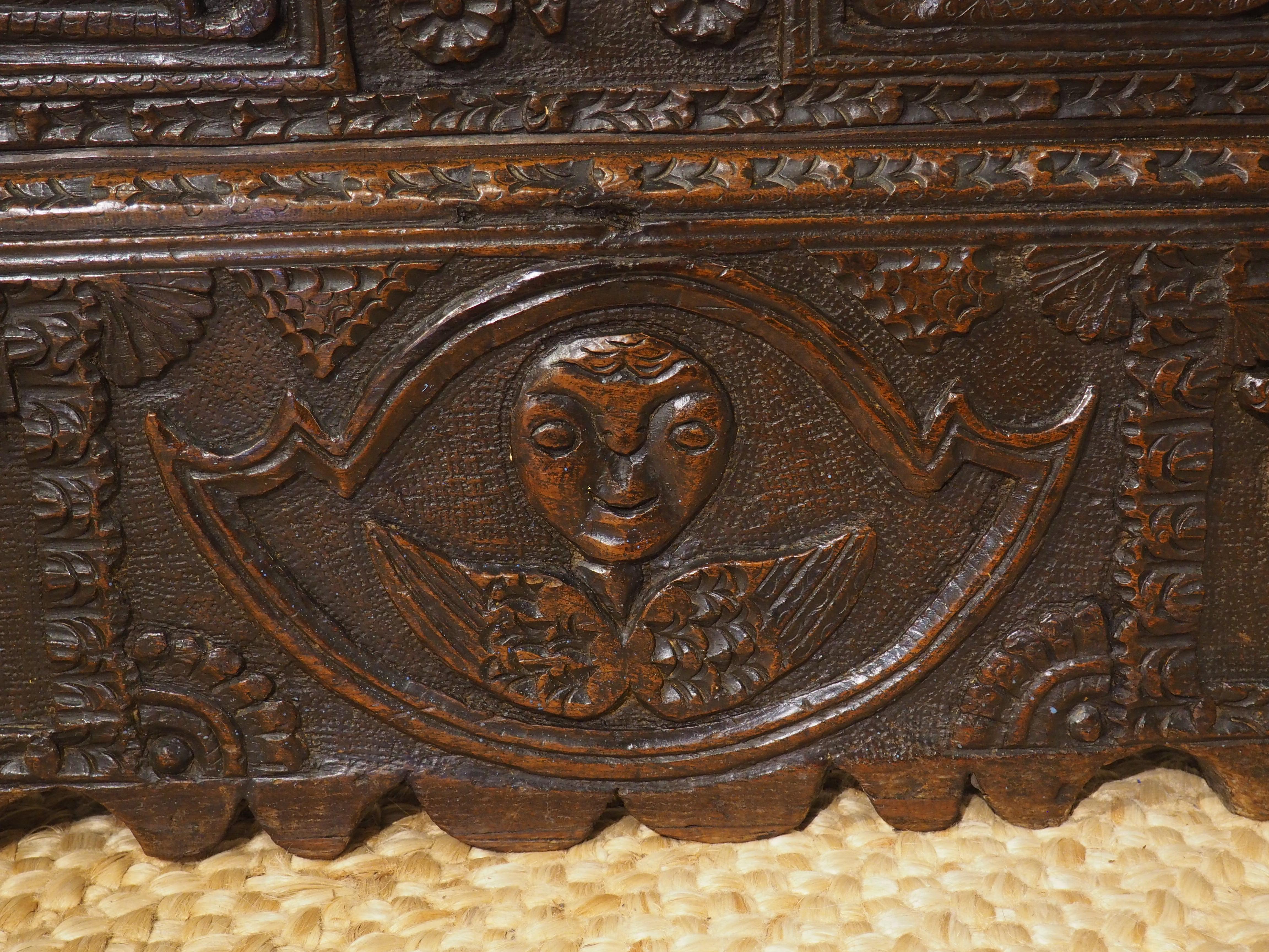 Large and Richly Carved 17th Century Walnut and Oak Trunk from Spain For Sale 5