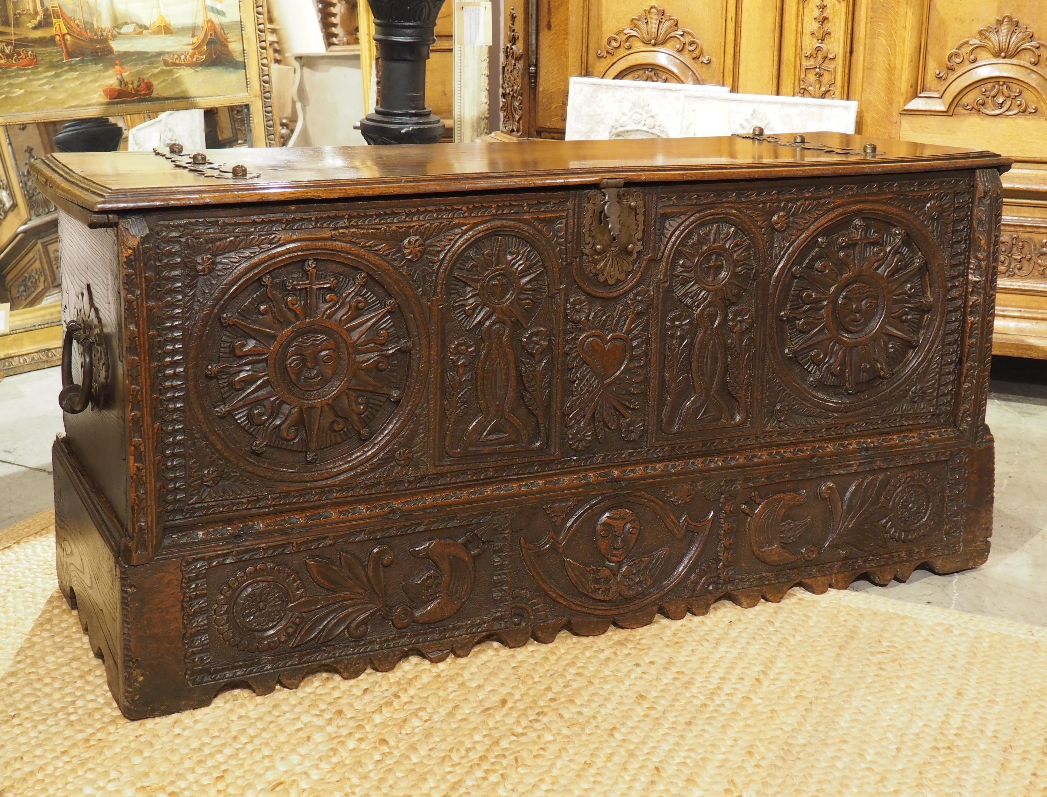 Large and Richly Carved 17th Century Walnut and Oak Trunk from Spain For Sale 12