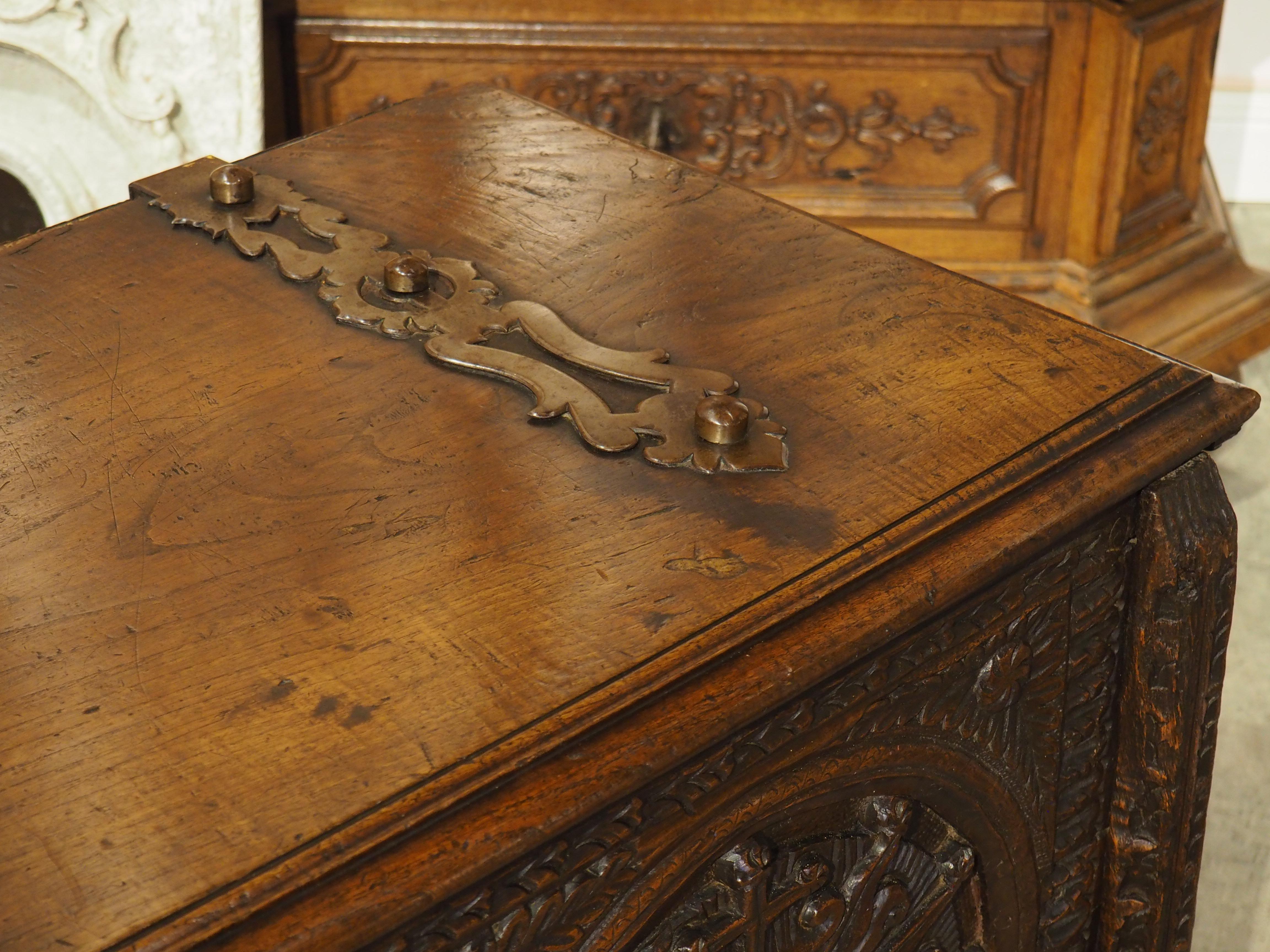 Spanish Large and Richly Carved 17th Century Walnut and Oak Trunk from Spain For Sale