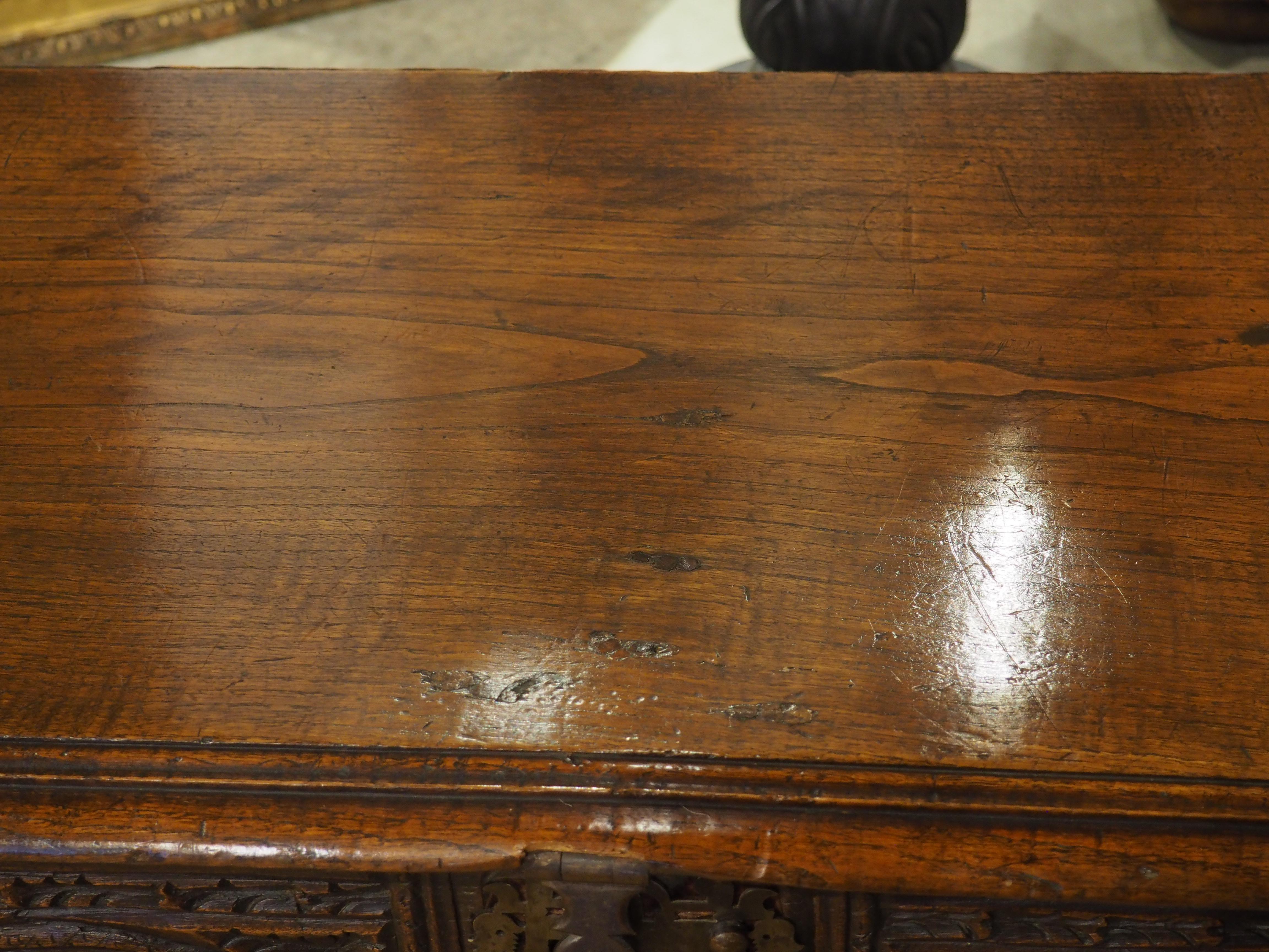 Large and Richly Carved 17th Century Walnut and Oak Trunk from Spain In Good Condition For Sale In Dallas, TX