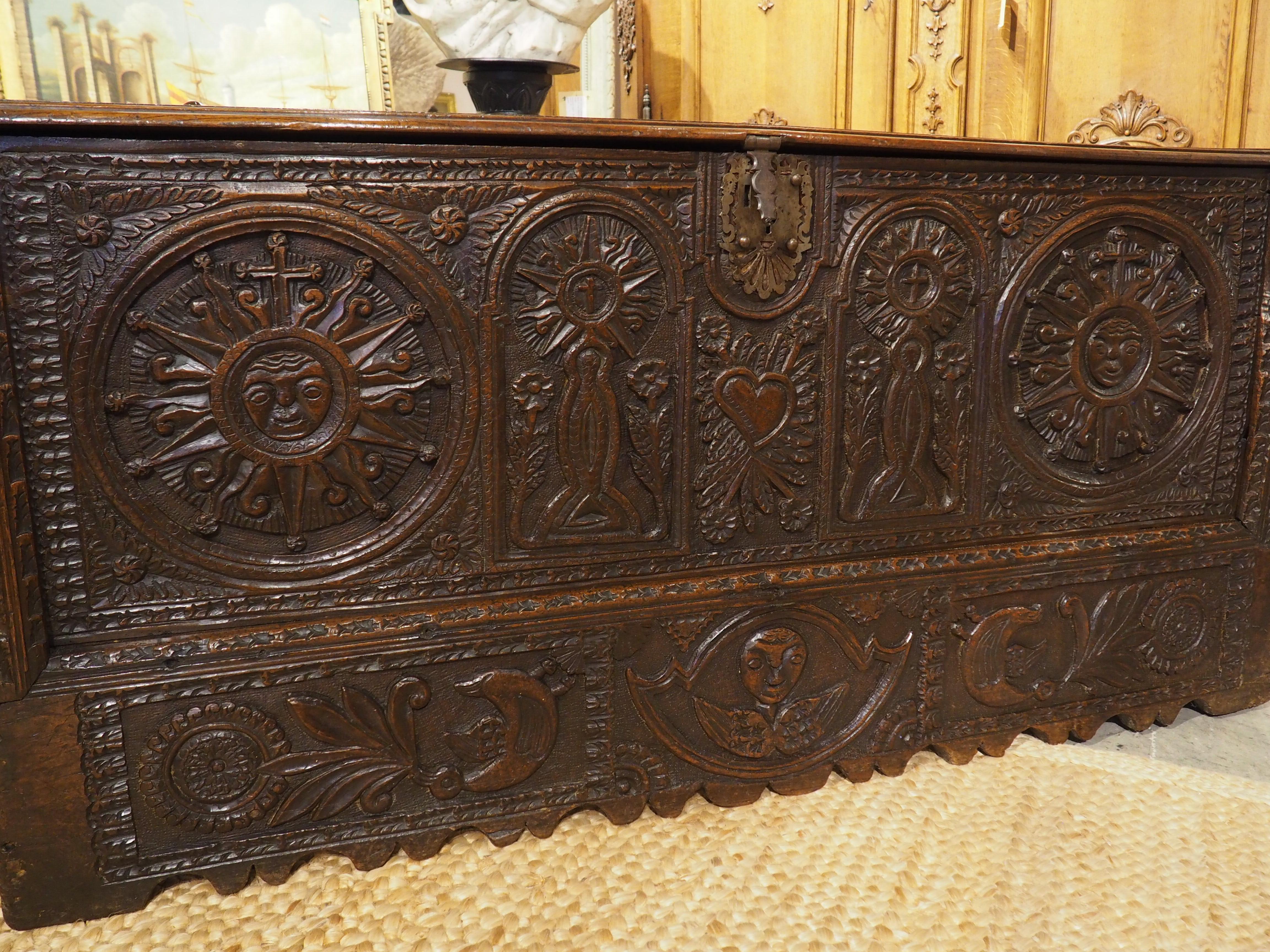 18th Century and Earlier Large and Richly Carved 17th Century Walnut and Oak Trunk from Spain For Sale