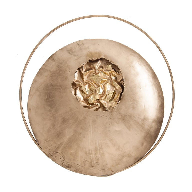 Large metal wall light composed of an aerial metal structure with gold finish.