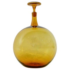 Grande et rare bouteille Blenko en forme de boule de couleur ambre avec bouchon