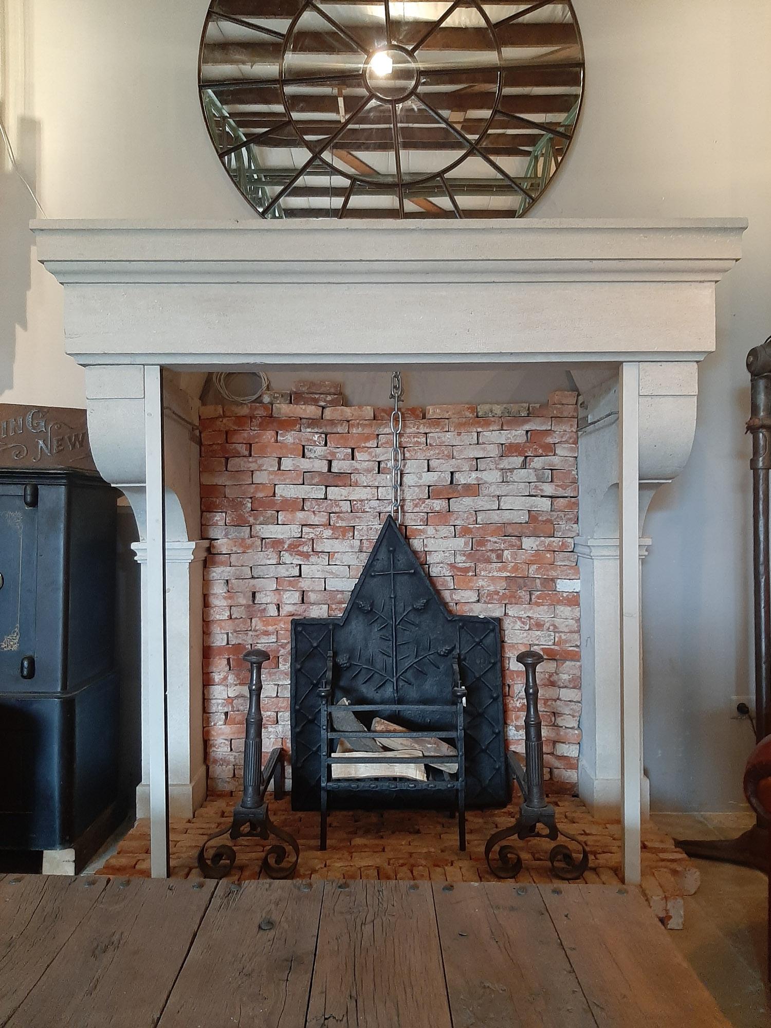 Large 19th Century Limestone Castle Fireplace. Crafted with precision, this french fireplace boasts a sleek mantelpiece that adds a touch of sophistication to any space.

Dimensions of H 187 x W 187 x D 90 cm
Inner Dimensions: H 149 x W 138 cm