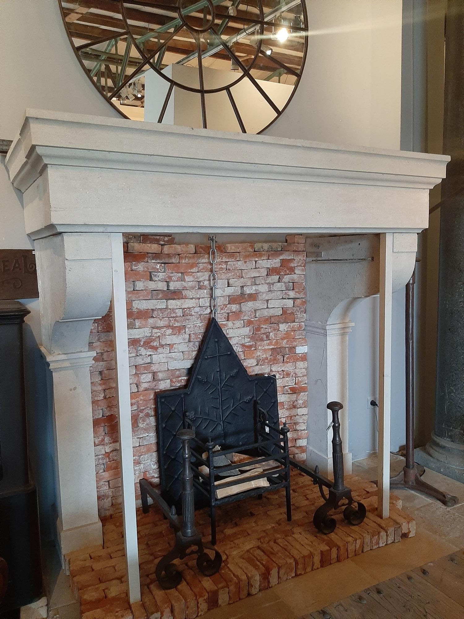 Large and Sleek 19th Century Limestone Castle Fireplace In Good Condition For Sale In Baambrugge, NL