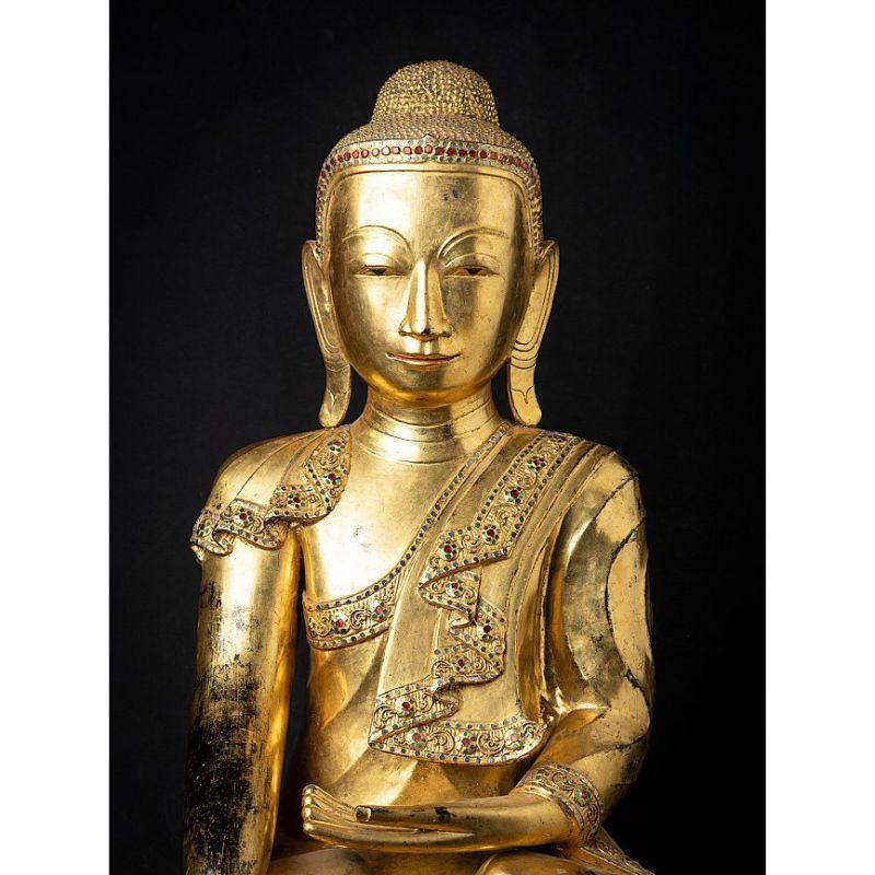 Material: lacquerware
80,5 cm high 
49,5 cm wide and 34,5 cm deep
Weight: 4.95 kgs
Gilded with 24 krt. gold
Shan (Tai Yai) style
Bhumisparsha mudra
Originating from Burma
Late 18th century
In exceptional good condition !

