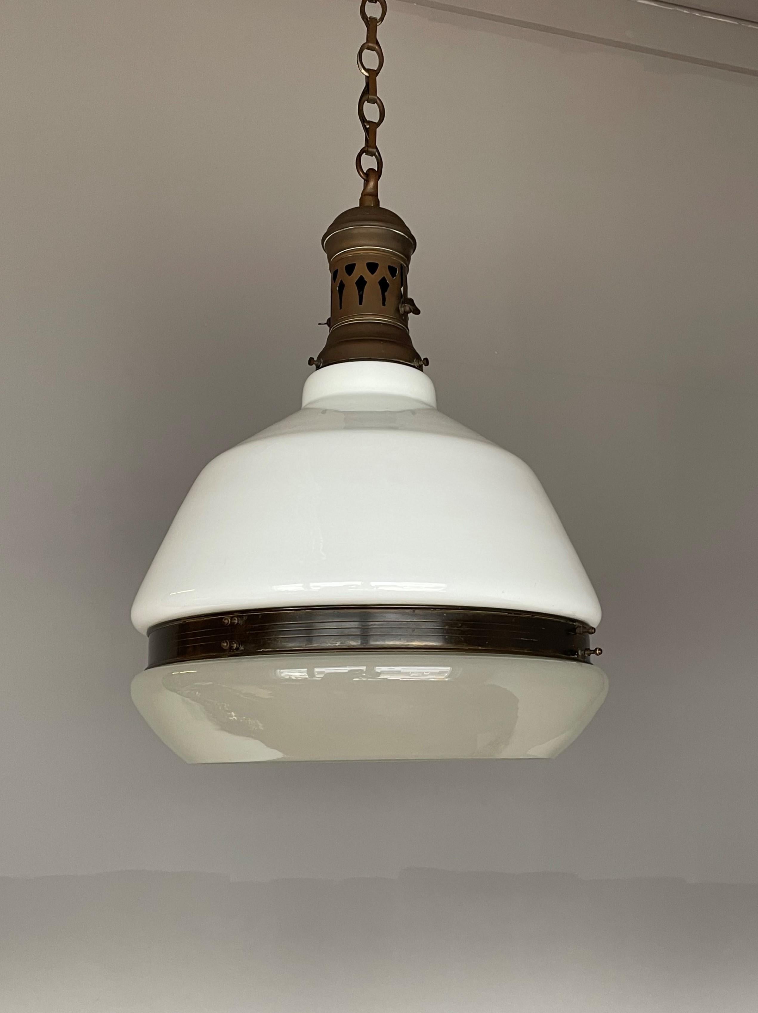 Marvelous and rare size Arts & Crafts pendant.

If you have bought and sold as many light fixtures as we have then you might think that we don't get surprised anymore. Well, this large and marvelous design pendant is unlike anything we have ever