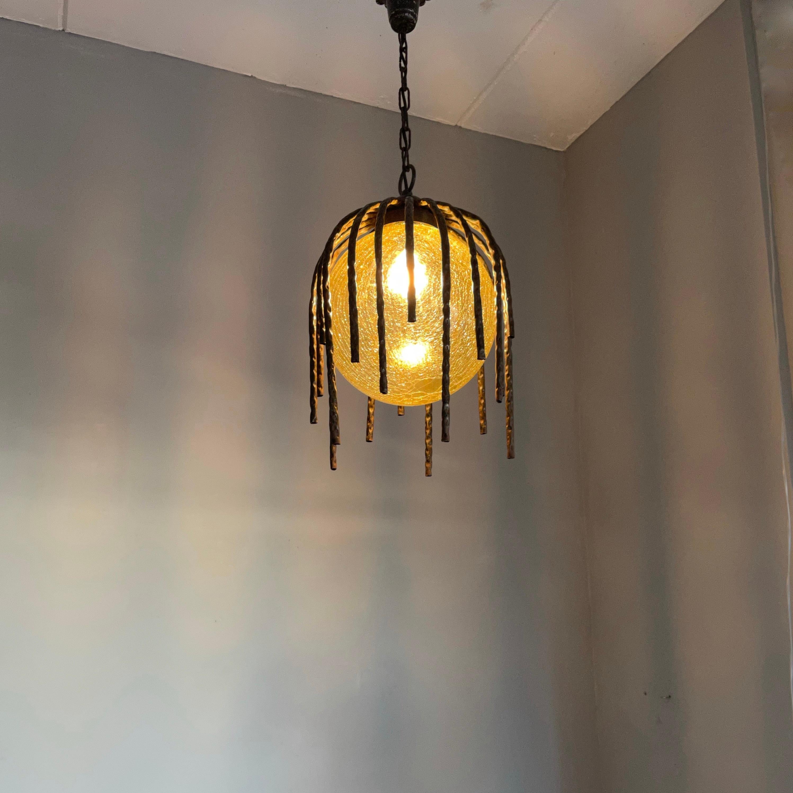 Mid-Century Modern Large and Striking, Midcentury Crackled Amber Glass in Iron Frame Pendant Light For Sale