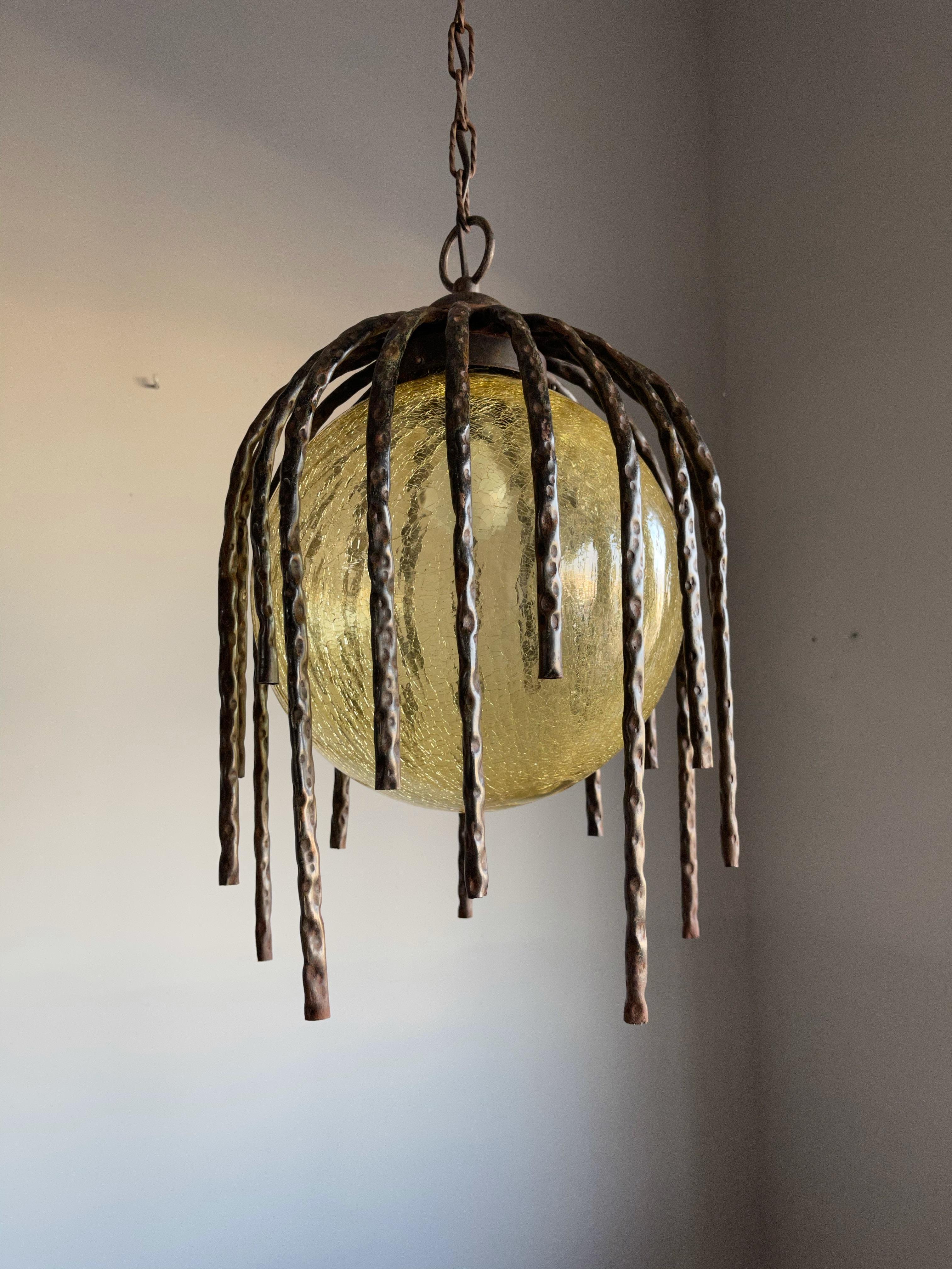 Hand-Crafted Large and Striking, Midcentury Crackled Amber Glass in Iron Frame Pendant Light For Sale