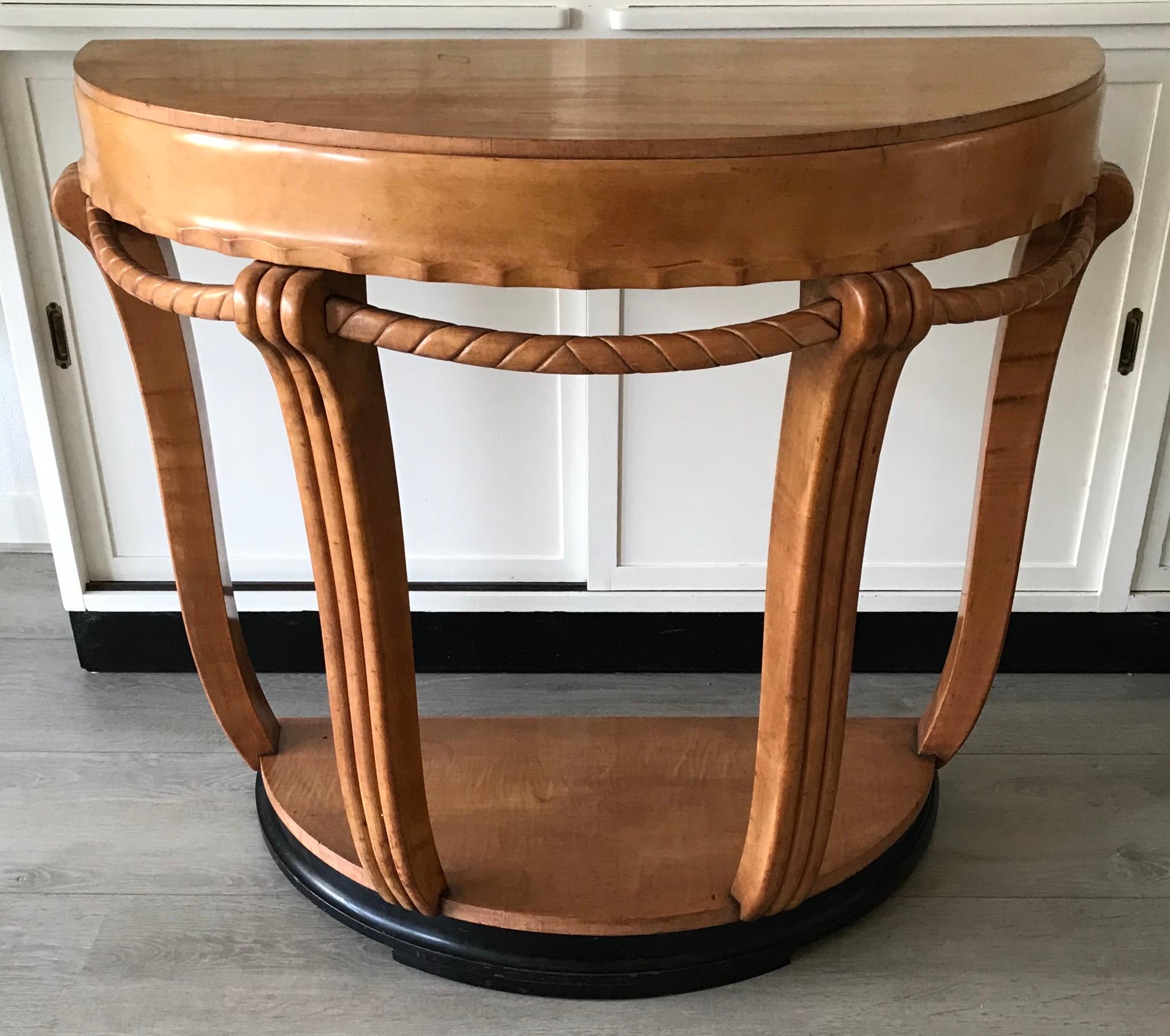Beautiful shape and color Art Deco rounded console / sidetable.

If you are looking for a sizeable and impressive sidetable to grace your entrance or an other living space then this Fine and rare example from the early 20th century could be perfect