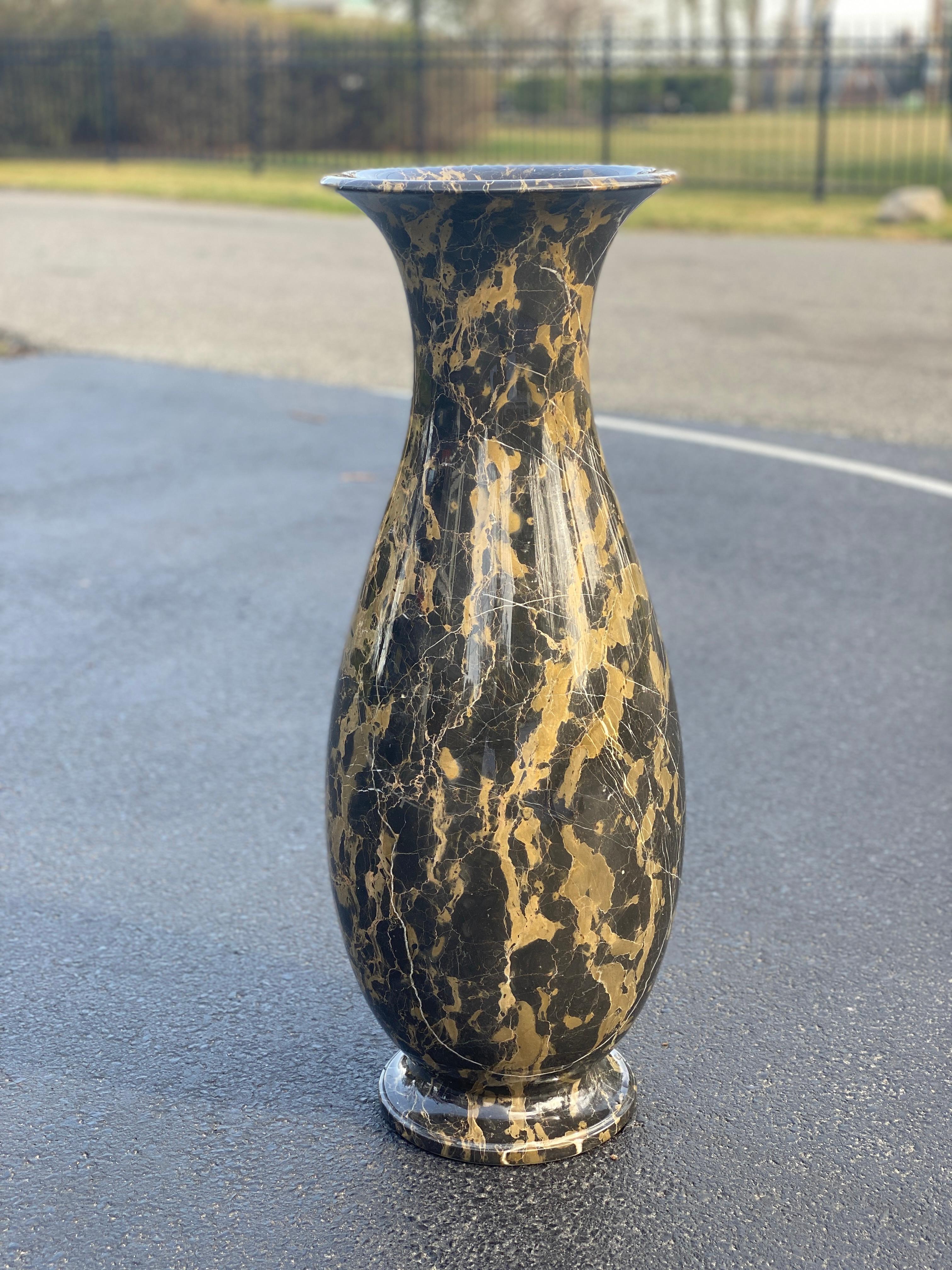 Very tall floor vase or urn, the polished marble vessel has dark brown color with defined white and golden veins which are the qualities that highlighted the beauty of this stone for many centuries. The vessel is very heavy and perfectly suited for