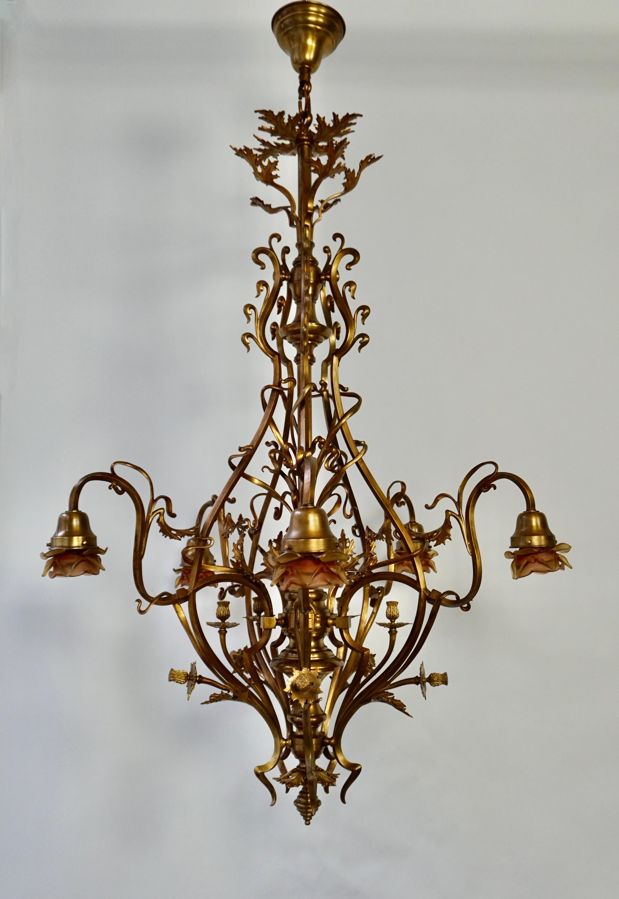 One of a kind antique light fixture from the early Art Nouveau era.    

This marvelously handcrafted bronze and brass fixture dates from the earliest days of European indoor lighting. The flowing and truly elegant design and the quality of the