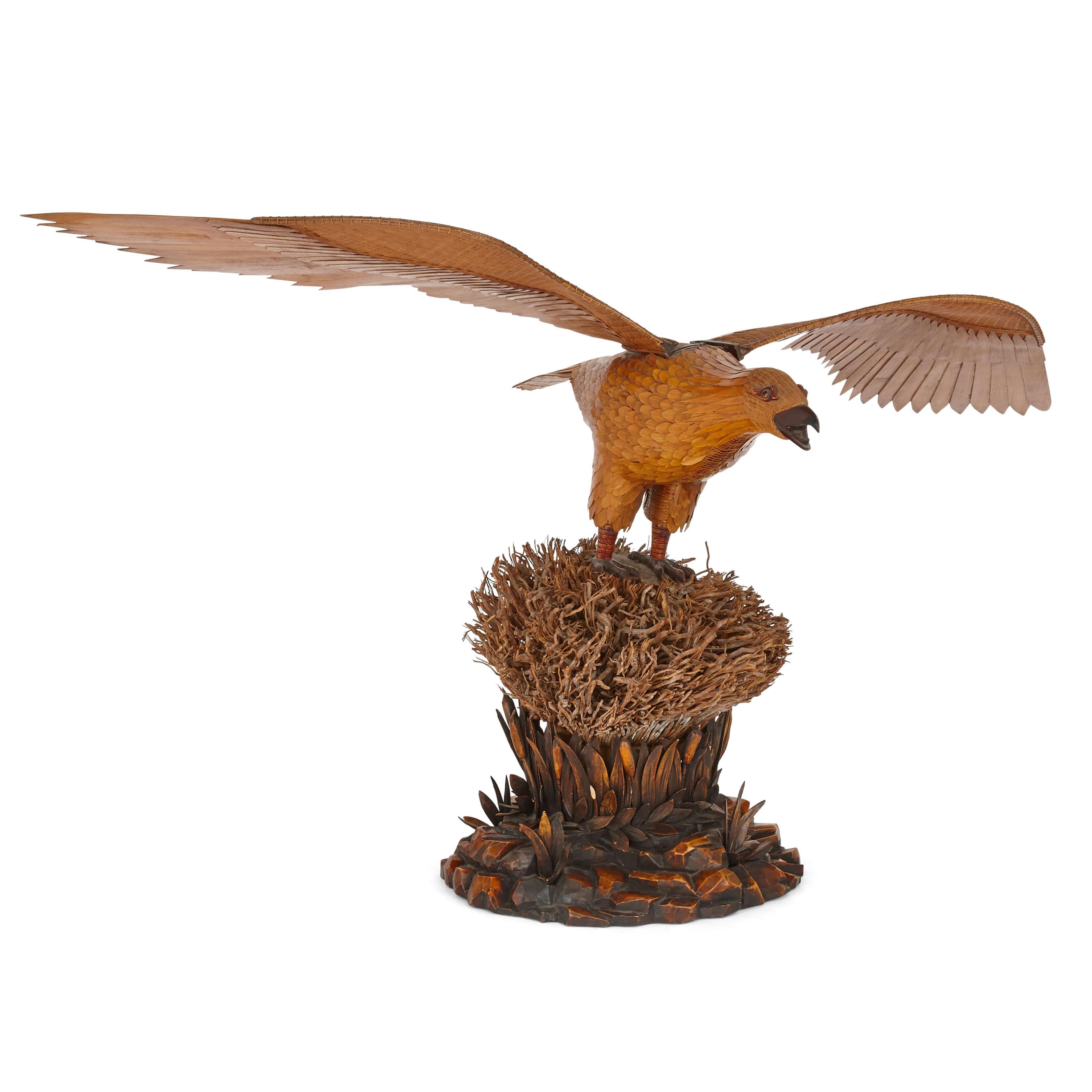Large and unusual Chinese bamboo and wood eagle sculpture
Chinese, 20th century
Dimensions: Height 64cm, width 116cm, depth 57cm

This large Chinese bamboo and wood sculpture, depicts an eagle with its wings outstretched. The feathers have been